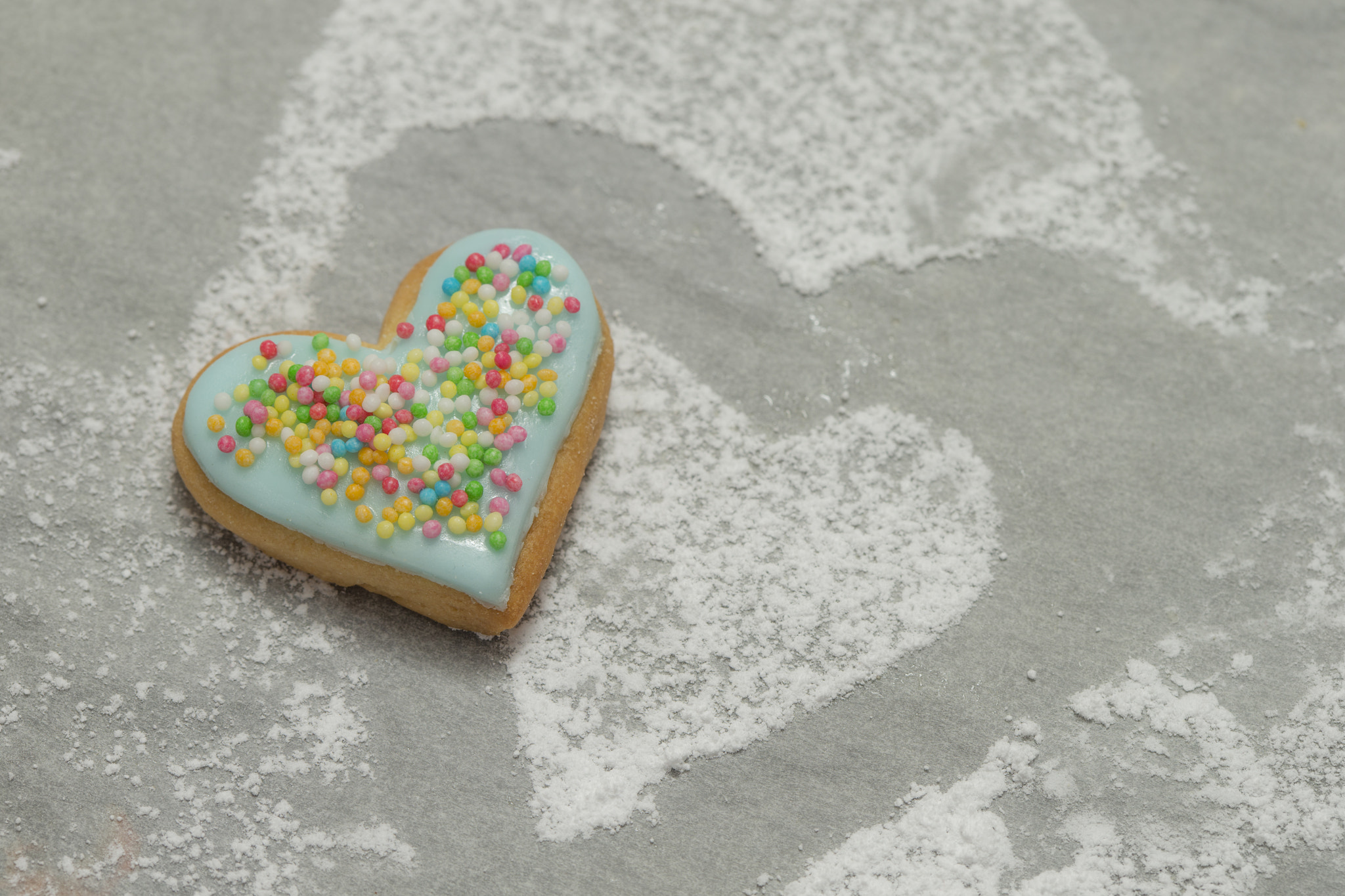 Canon EOS-1D X + Canon EF 100mm F2.8 Macro USM sample photo. Baked valentine's heart covered with blue icing and confetti photography