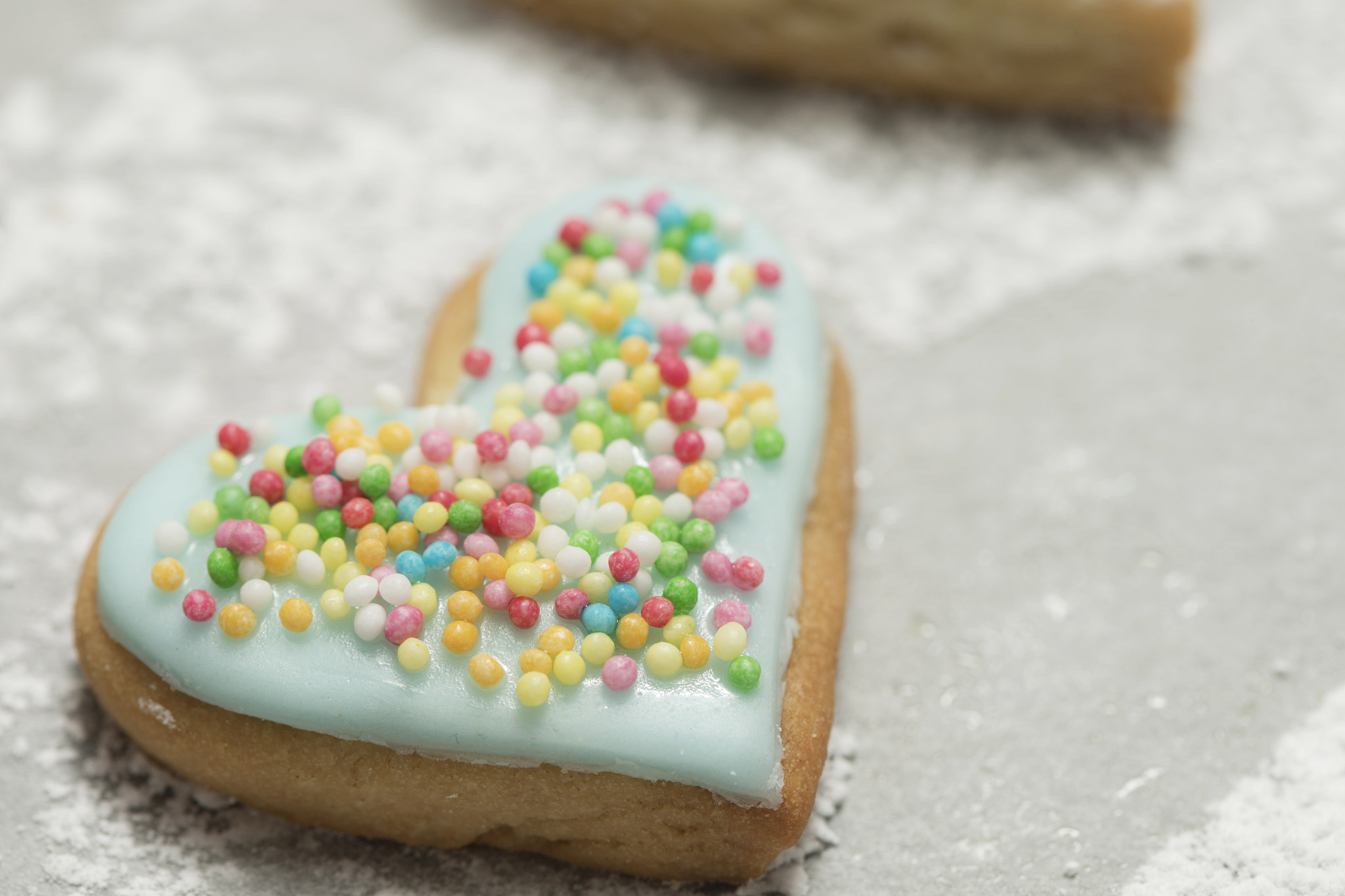 Canon EOS-1D X + Canon EF 100mm F2.8 Macro USM sample photo. Baked valentine's heart covered with blue icing and confetti photography