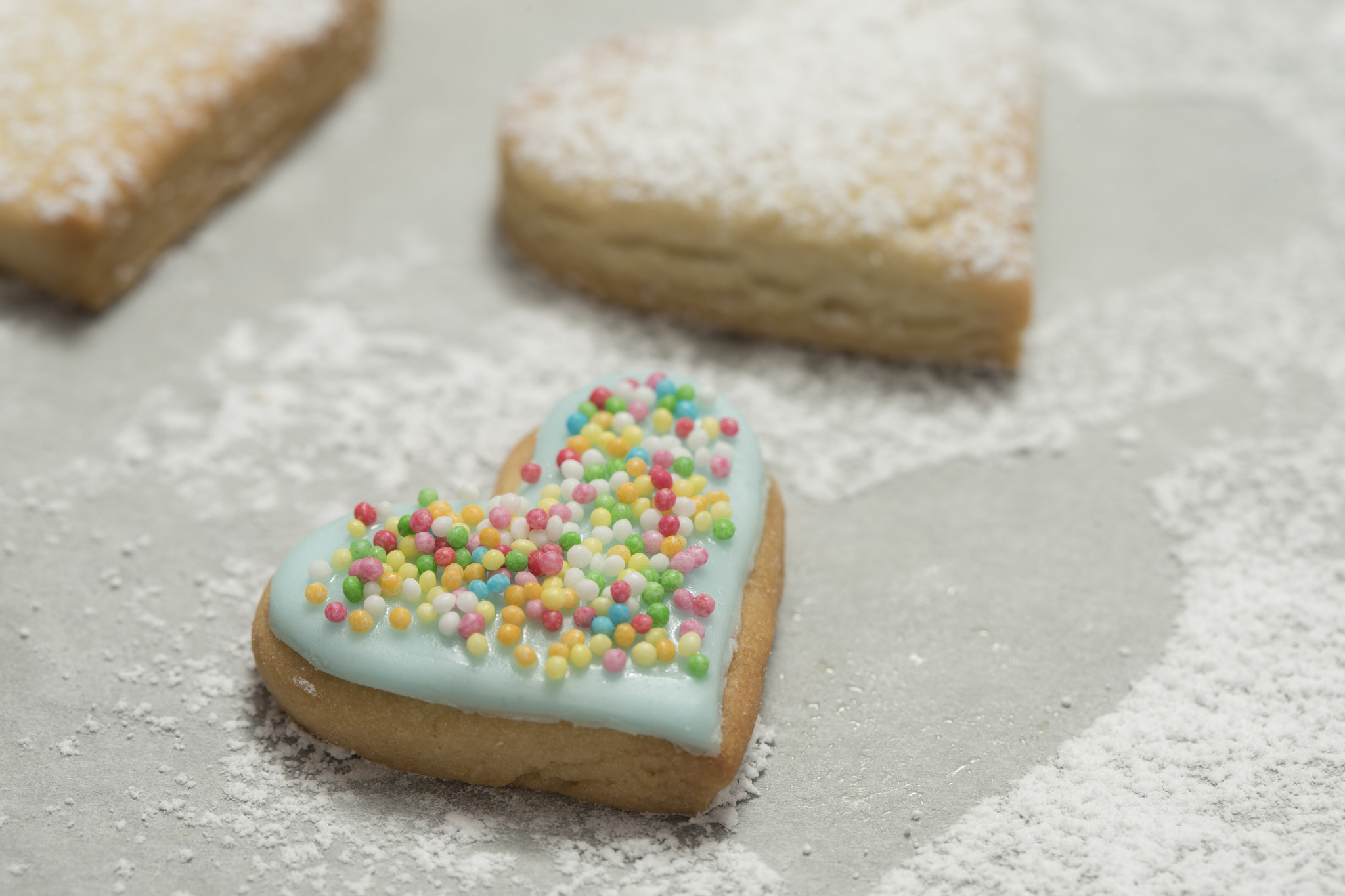 Canon EOS-1D X + Canon EF 100mm F2.8 Macro USM sample photo. Baked valentine's heart covered with blue icing and confetti photography