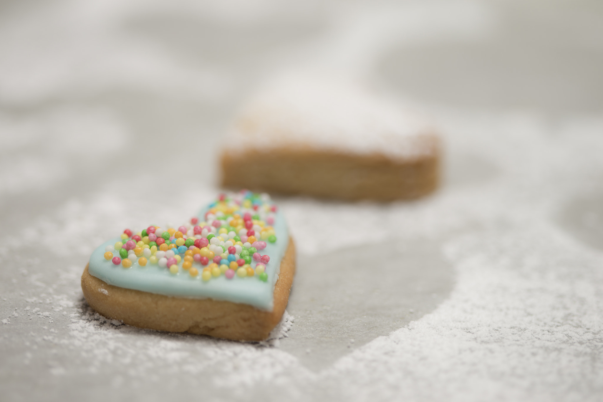 Canon EOS-1D X + Canon EF 100mm F2.8 Macro USM sample photo. Baked valentine's heart covered with blue icing and confetti photography