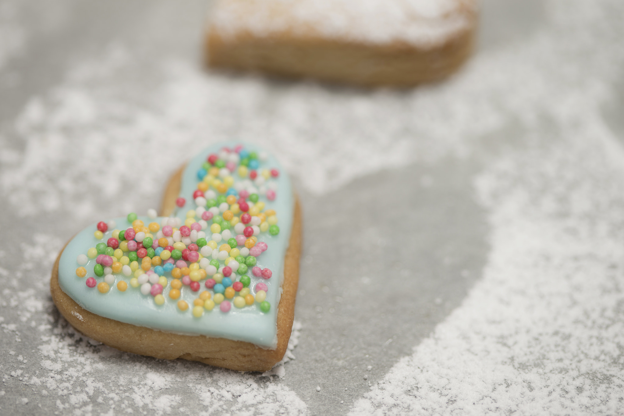 Canon EOS-1D X + Canon EF 100mm F2.8 Macro USM sample photo. Baked valentine's heart covered with blue icing and confetti photography