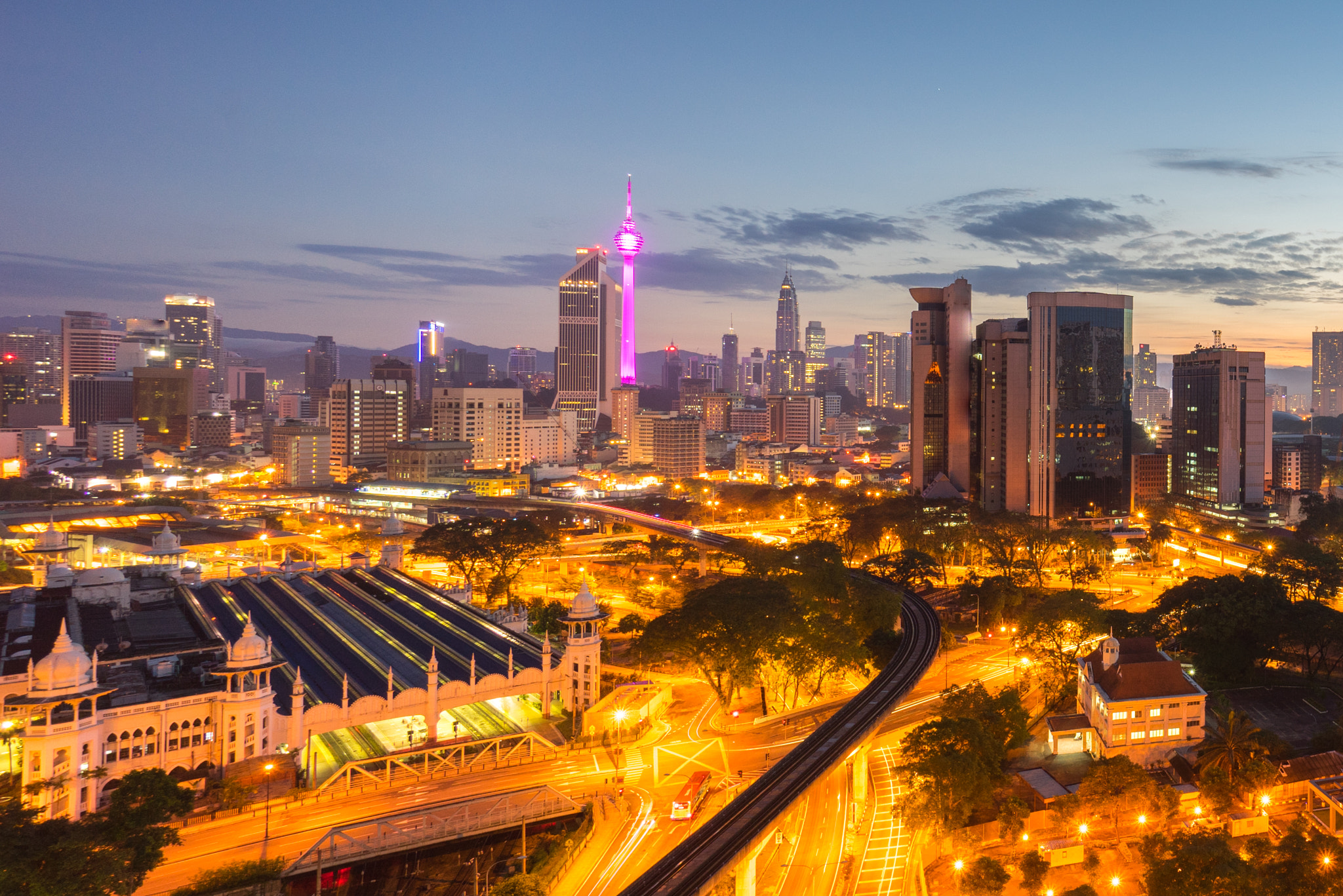 Sony a7R + Sony E 10-18mm F4 OSS sample photo. Beautiful sunrise at kuala lumpur city centre photography