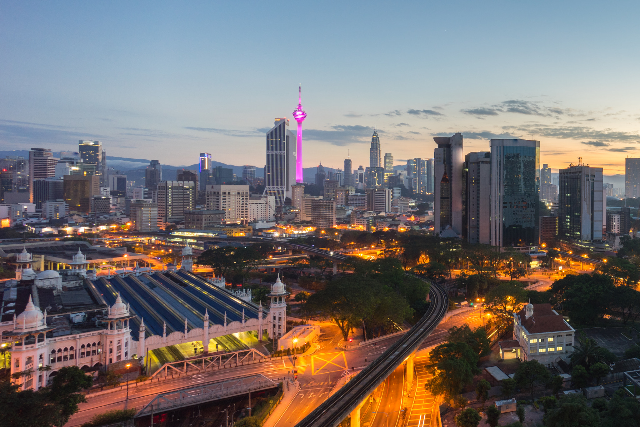 Sony a7R + Sony E 10-18mm F4 OSS sample photo. Beautiful sunrise at kuala lumpur city centre photography
