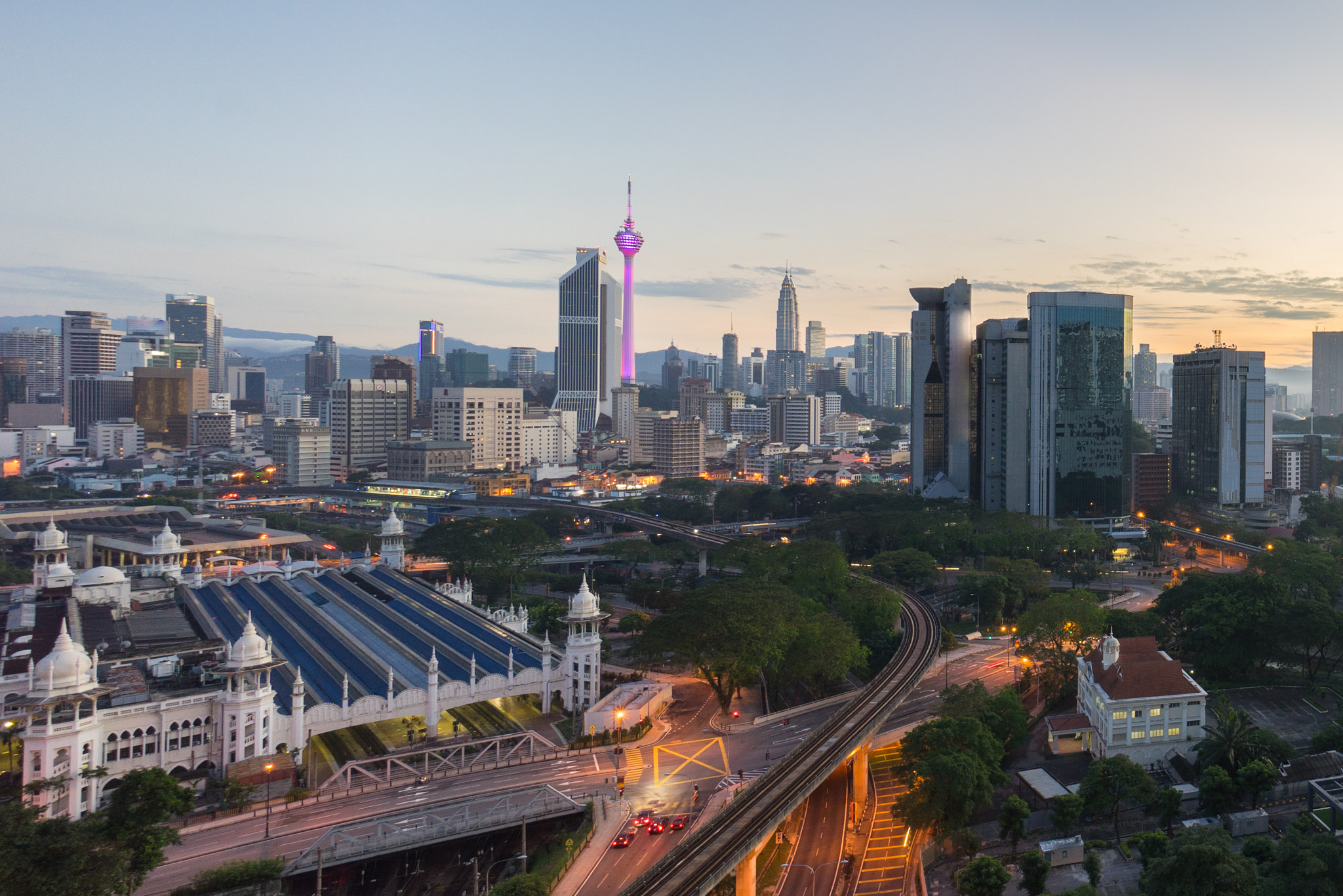 Sony a7R + Sony E 10-18mm F4 OSS sample photo. Beautiful sunrise at kuala lumpur city centre photography