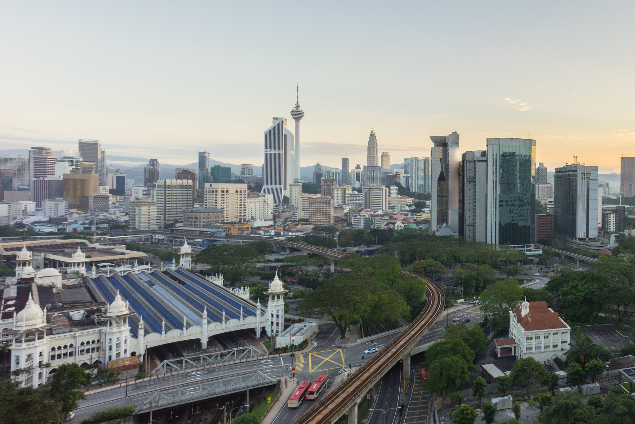 Sony a7R + Sony E 10-18mm F4 OSS sample photo. Beautiful sunrise at kuala lumpur city centre photography