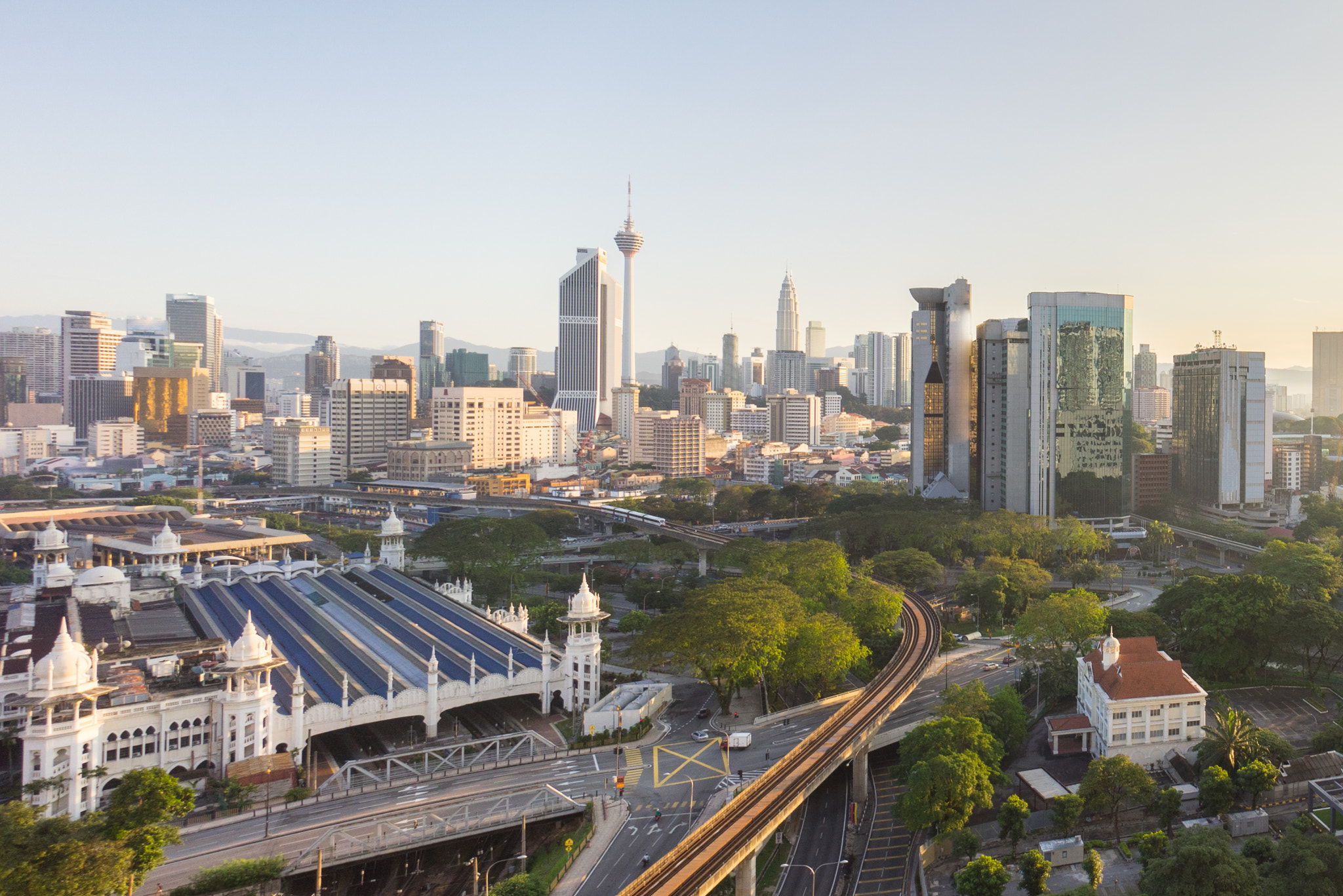 Sony a7R + Sony E 10-18mm F4 OSS sample photo. Beautiful sunrise at kuala lumpur city centre photography