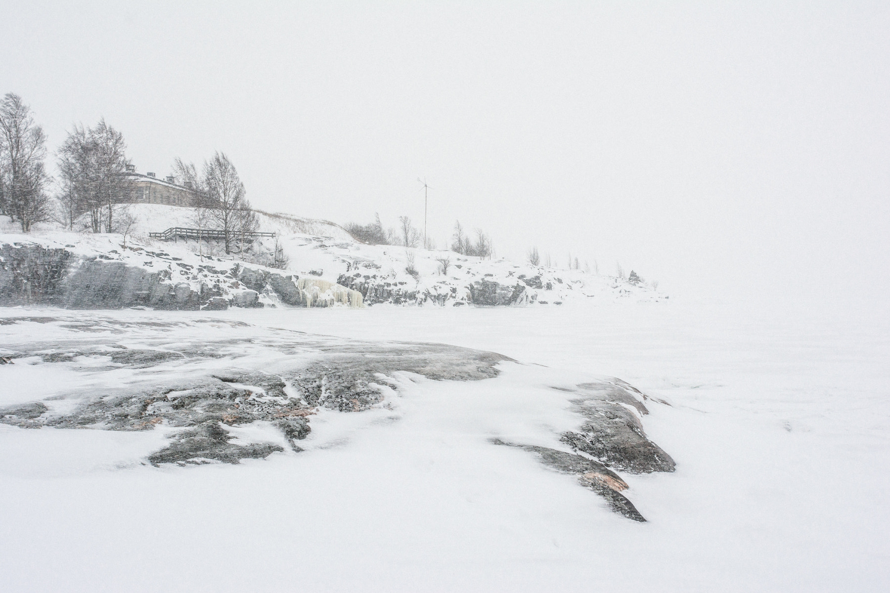 Nikon D7100 + Nikon AF Nikkor 24mm F2.8D sample photo. Snow storm in helsinki photography