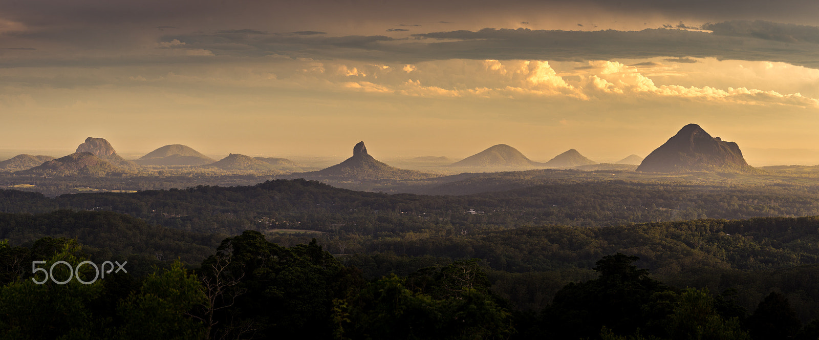 Sony E 55-210mm F4.5-6.3 OSS sample photo. Glasshouse mountains - prehistoric pano photography