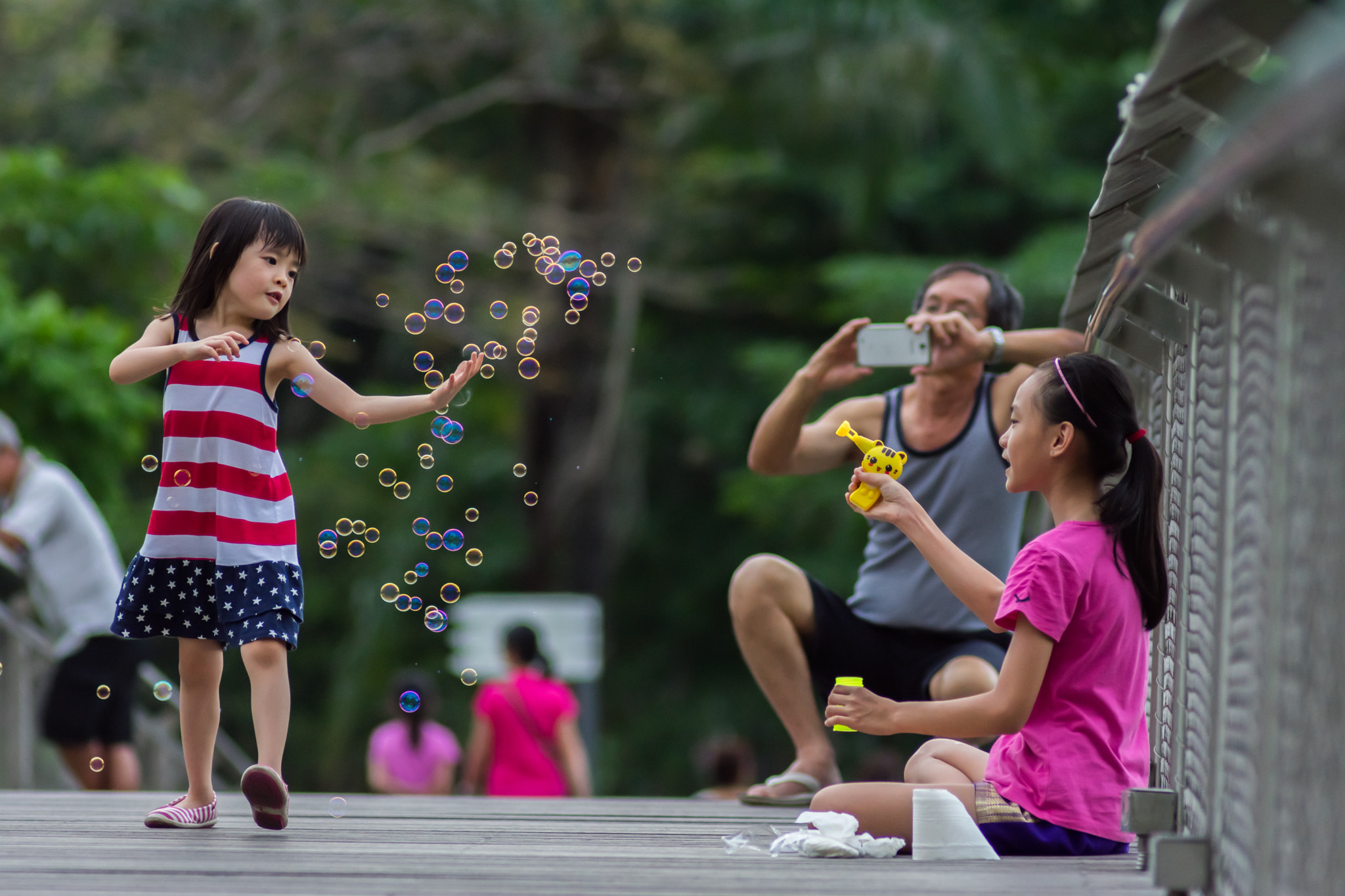 Nikon D5300 + Nikon AF Nikkor 180mm F2.8D ED-IF sample photo. Chasing bubbles photography