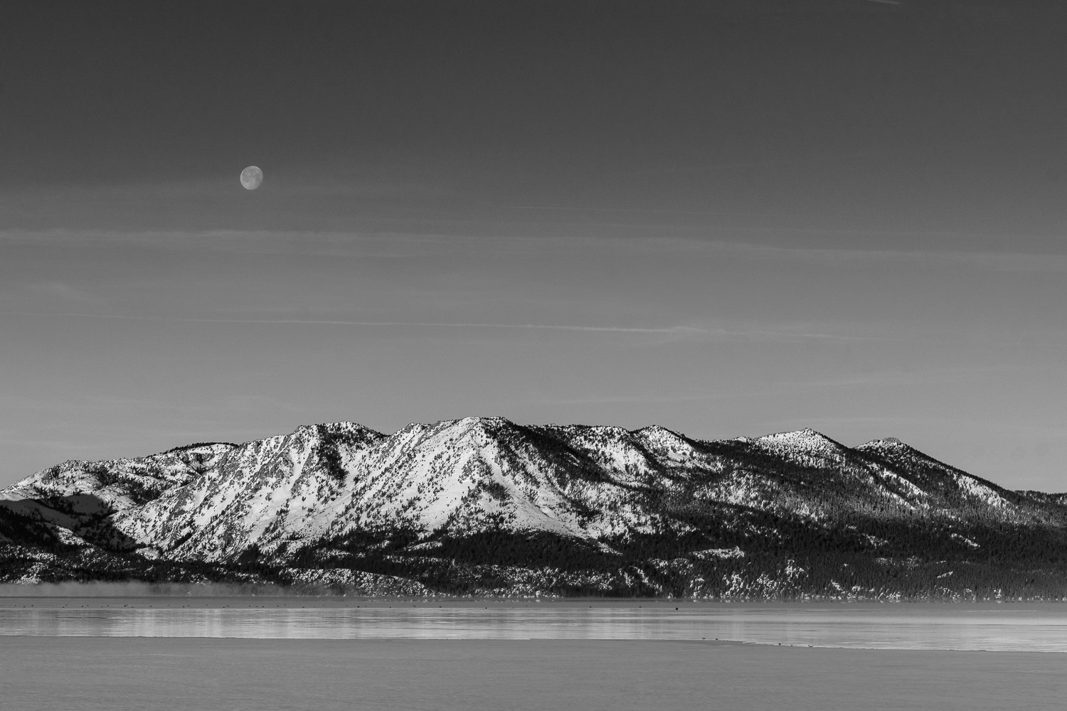 Sony ILCA-77M2 + Tamron AF 28-75mm F2.8 XR Di LD Aspherical (IF) sample photo. Setting moon at sunrise over south lake tahoe photography