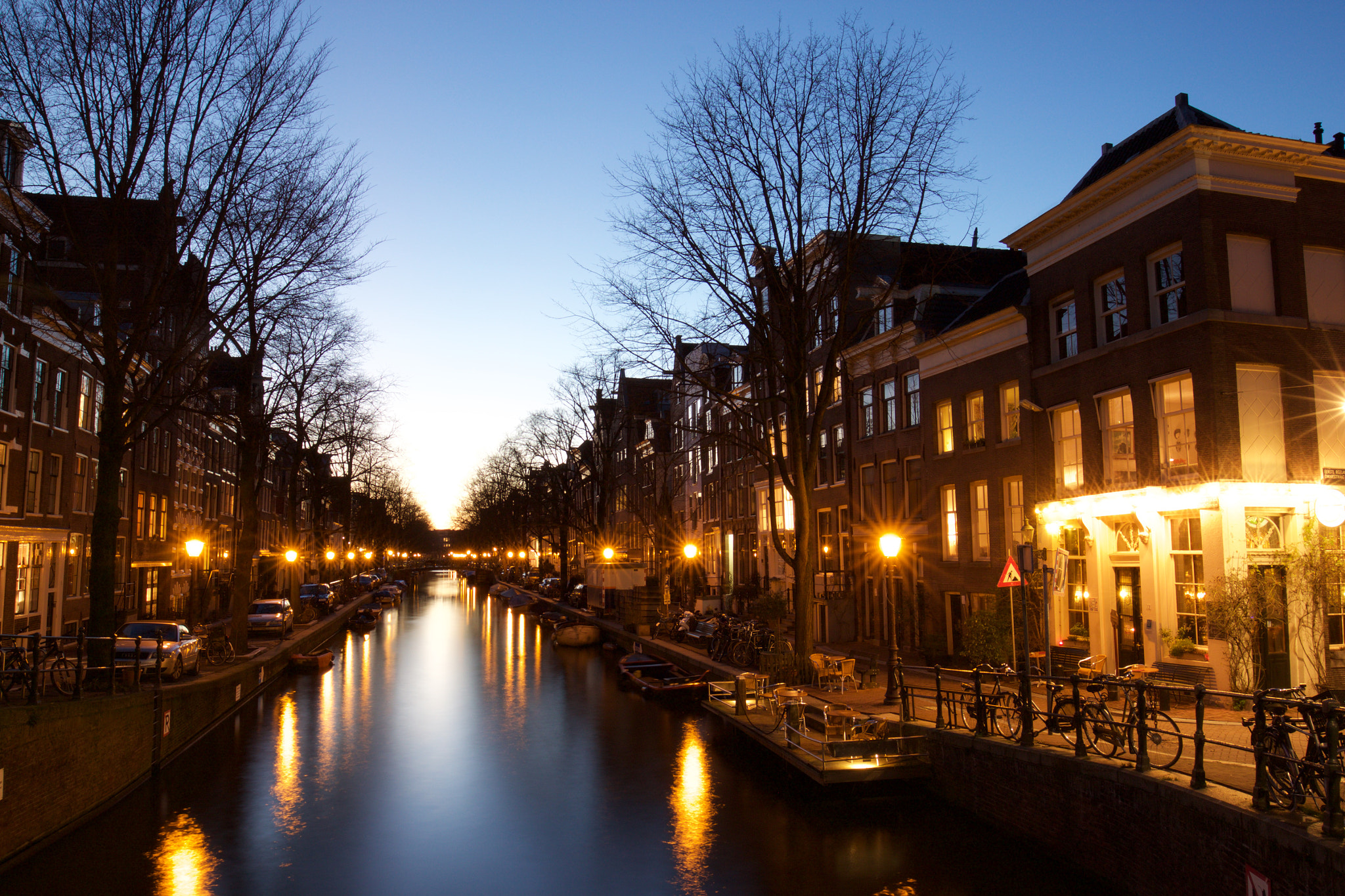 Canon EOS 500D (EOS Rebel T1i / EOS Kiss X3) + Canon EF 16-35mm F4L IS USM sample photo. Blue hour in amsterdam photography