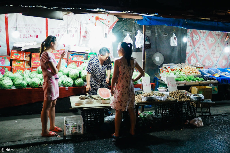 Olympus OM-D E-M10 + Panasonic Lumix G 14mm F2.5 ASPH sample photo. Streets in xi'an，china photography