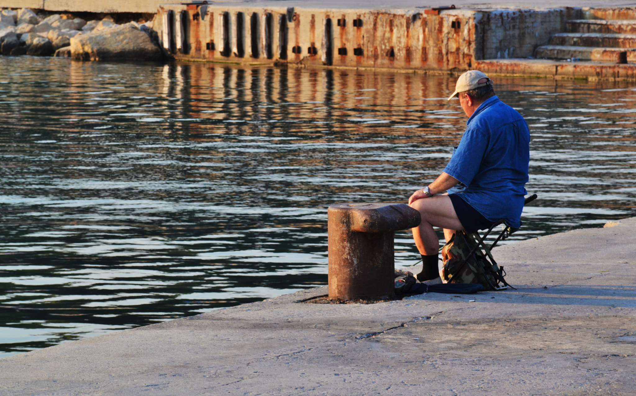 Nikon D3100 + Sigma 18-125mm F3.8-5.6 DC OS HSM sample photo. The lonely fisherman photography