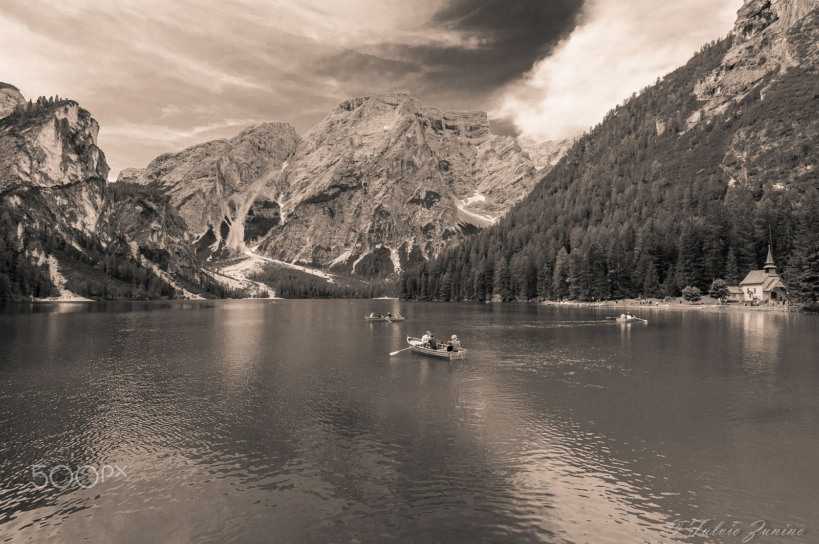 Sigma 12-24mm F4.5-5.6 EX DG Aspherical HSM sample photo. Boats on braies lake in b&w photography