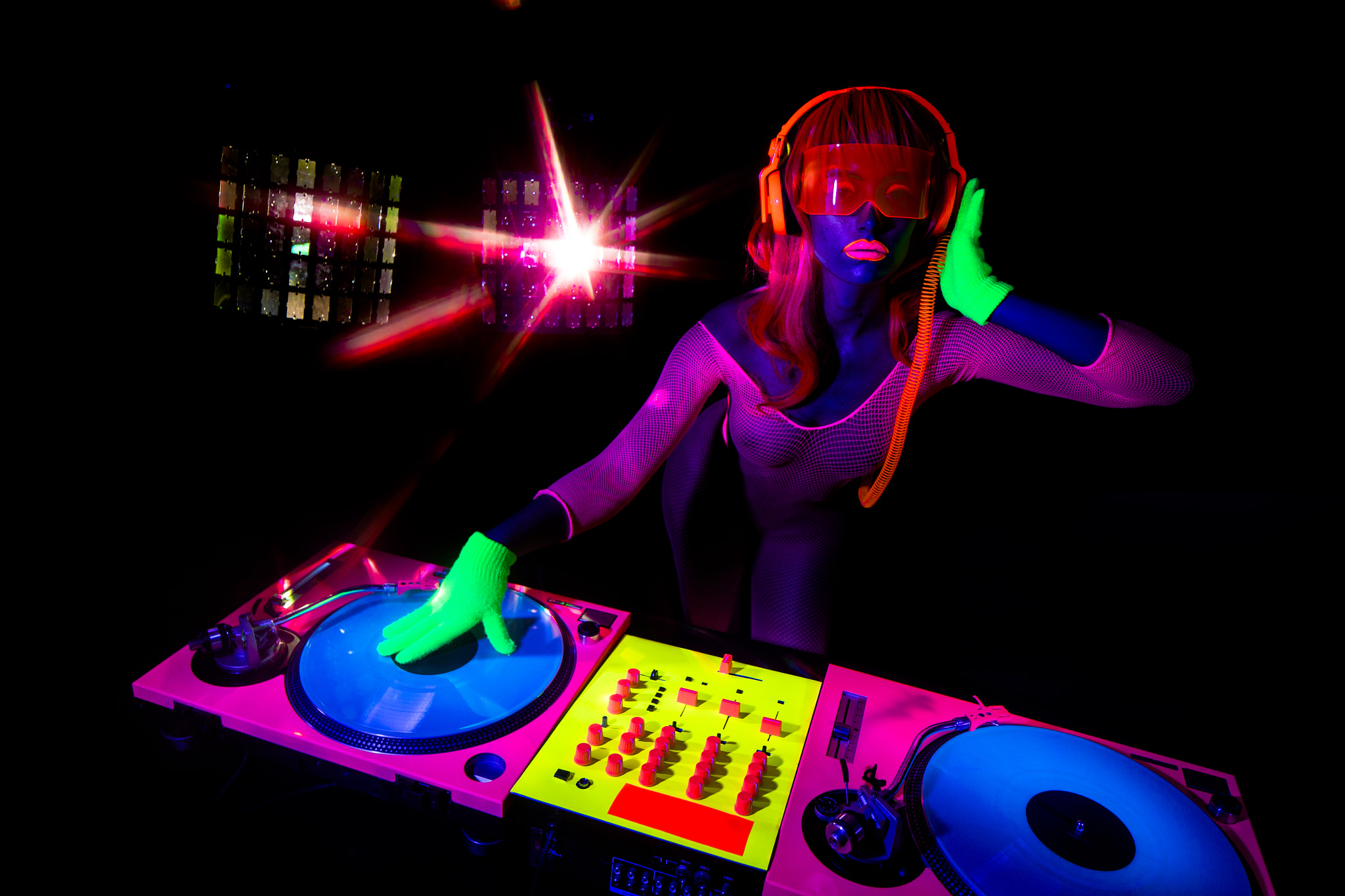 Canon EOS-1D X + Canon TS-E 24.0mm f/3.5 L II sample photo. Sexy neon uv glow dj photography