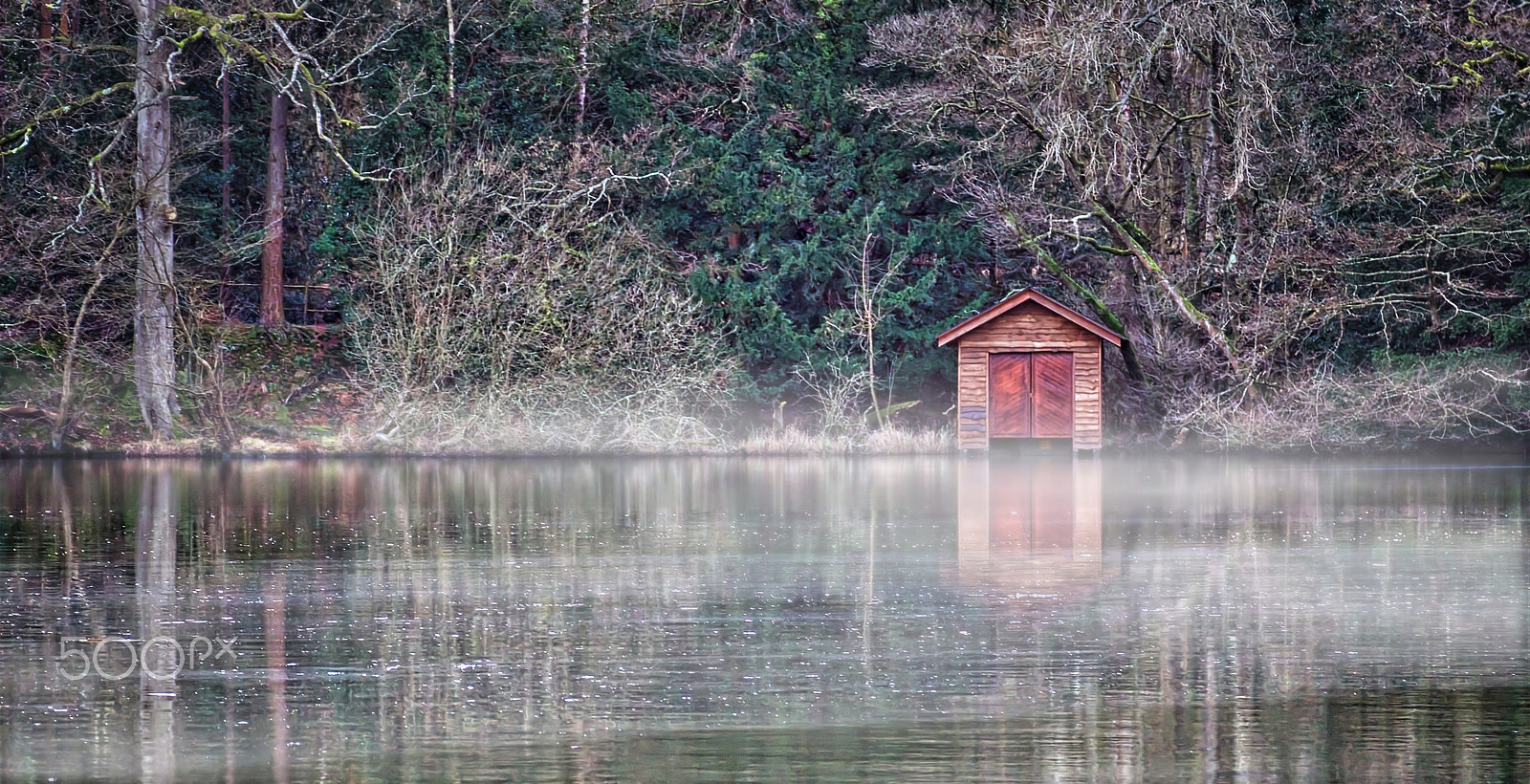 Panasonic Leica D Vario-Elmar 14-150mm F3.5-5.6 Asph Mega OIS sample photo. Lonely boathouse photography