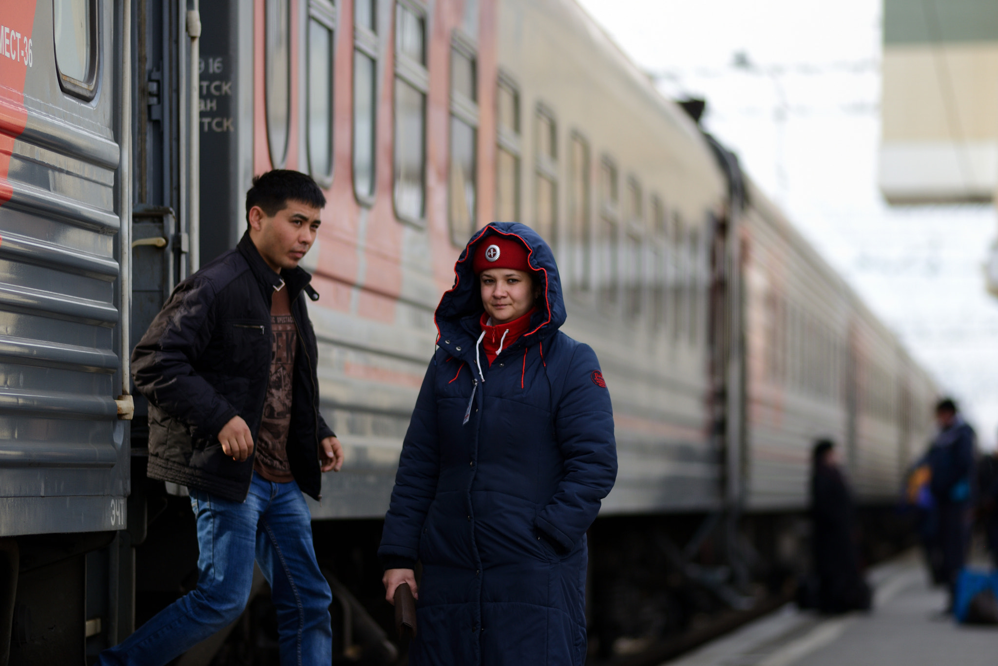 Nikon D600 + Nikon AF Nikkor 180mm F2.8D ED-IF sample photo. Train conductor photography