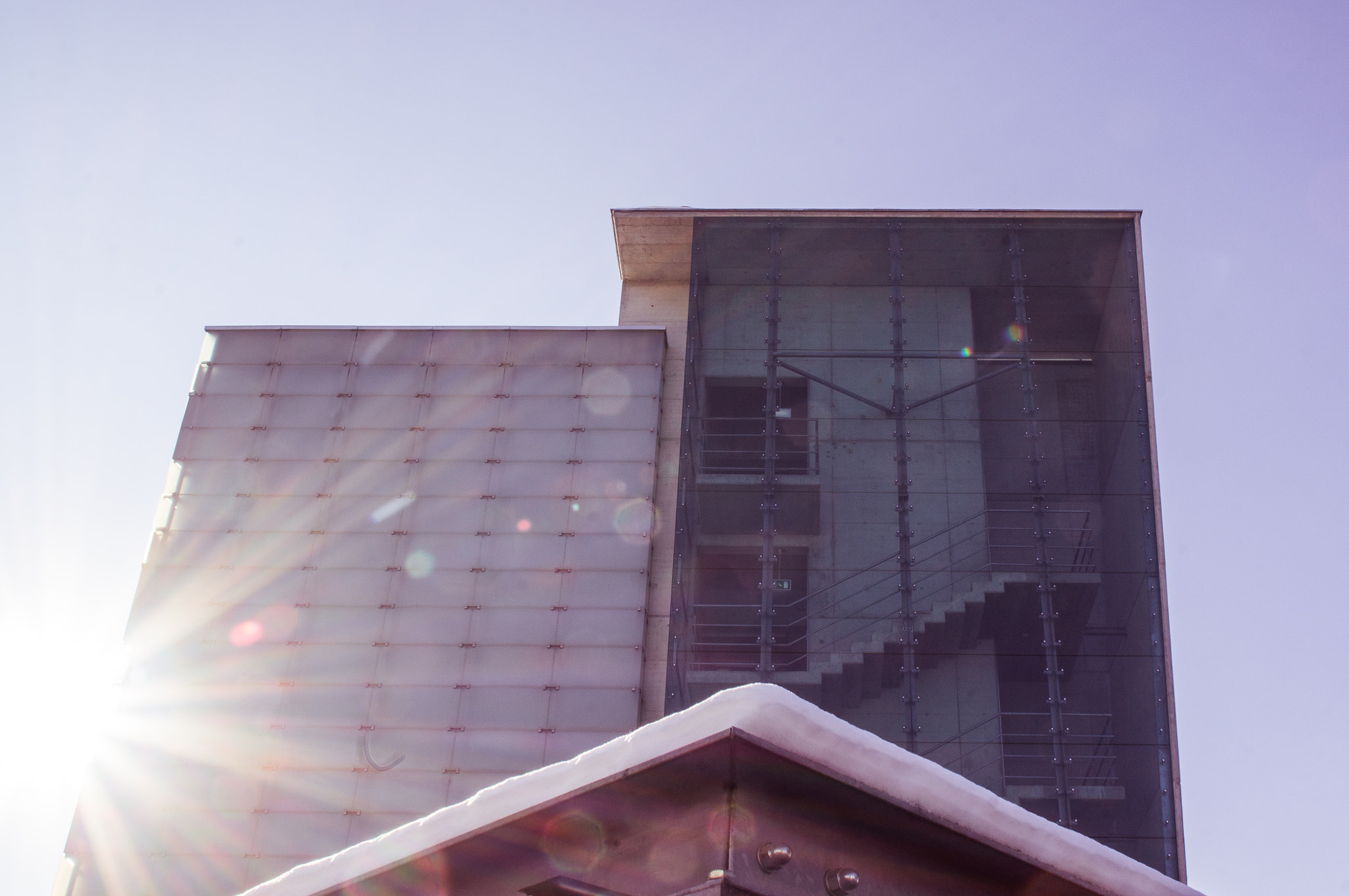 Sony SLT-A55 (SLT-A55V) + Tamron SP 24-70mm F2.8 Di VC USD sample photo. Sunrays, concrete, glass and some snow photography