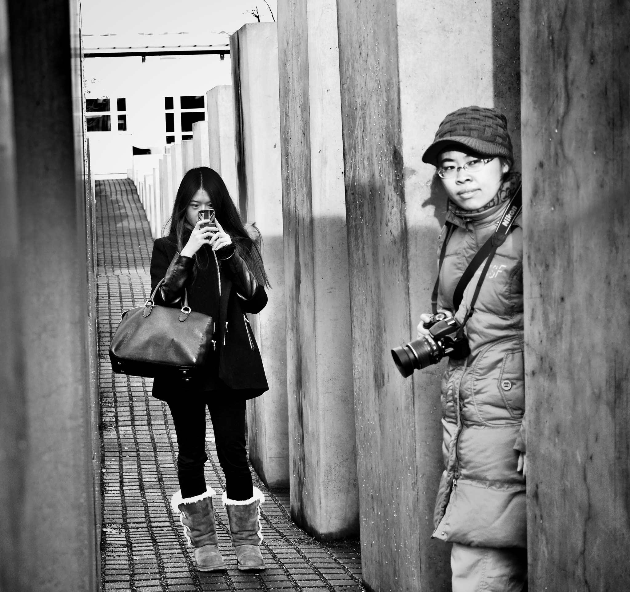 Panasonic Lumix G X Vario 12-35mm F2.8 ASPH Power OIS sample photo. - young people conquer the berlin holocaust memorial - photography
