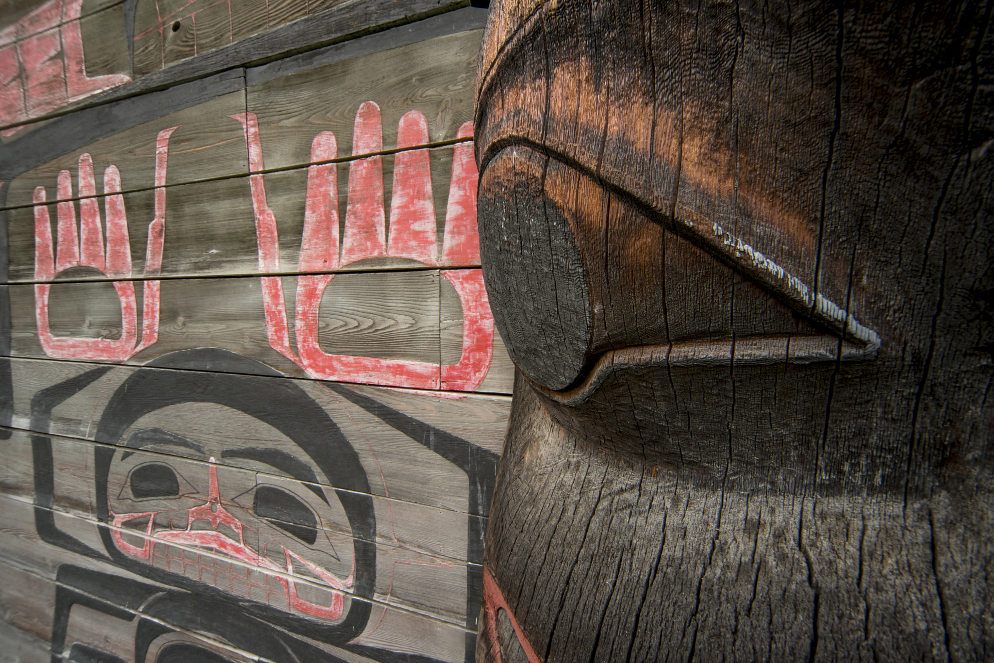 Sigma 12-24mm F4.5-5.6 EX DG Aspherical HSM sample photo. Bear figure on totem pole on lodge in ksan first nations village in hazelton bc photography