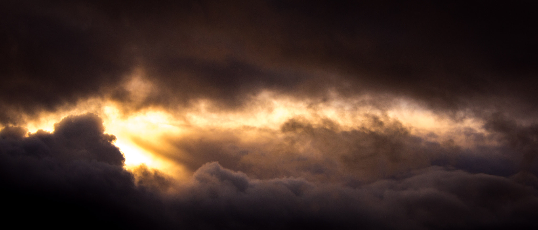 Sony SLT-A55 (SLT-A55V) sample photo. Sun poking through the clouds photography