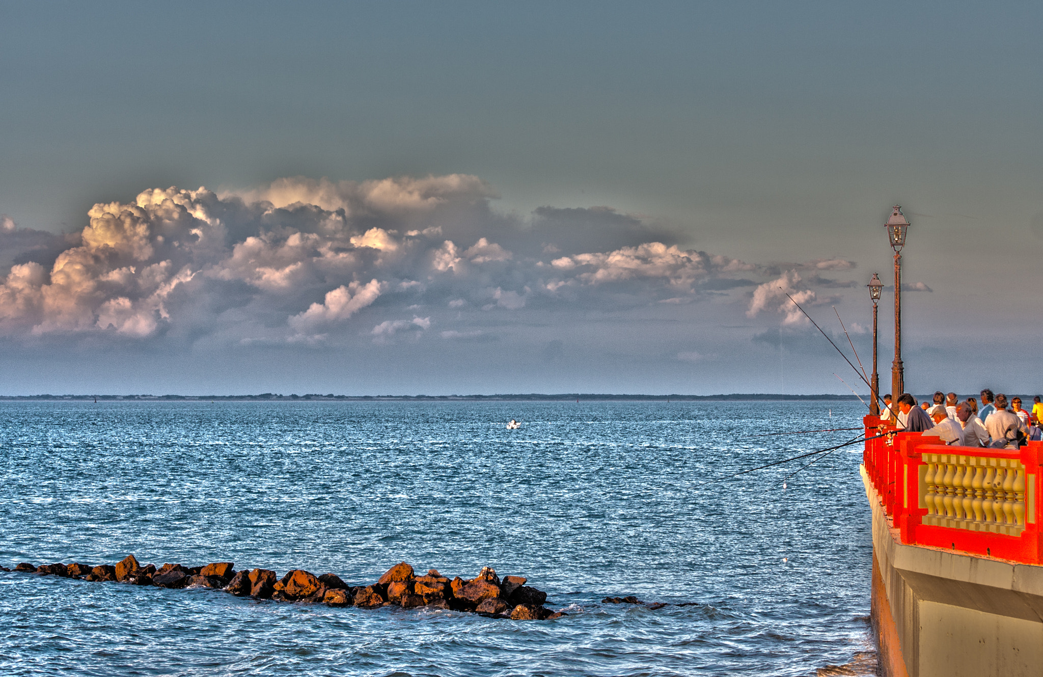 Sigma 55-200mm f/4-5.6 DC sample photo. Afternoon fishing near chipiona's lighthouse photography