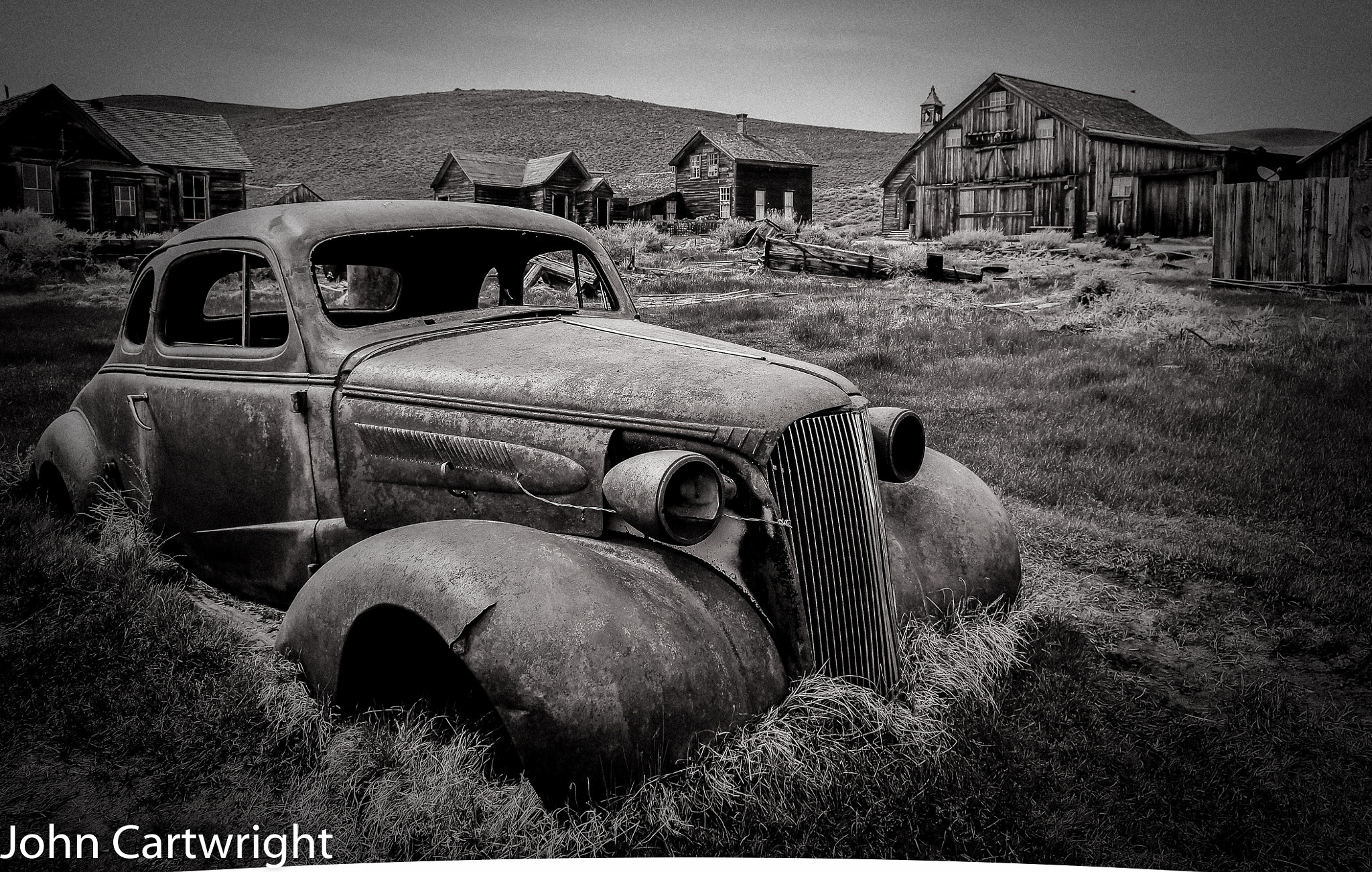 Pentax smc DA 17-70mm F4.0 AL (IF) SDM sample photo. Old car at bodie b/w photography
