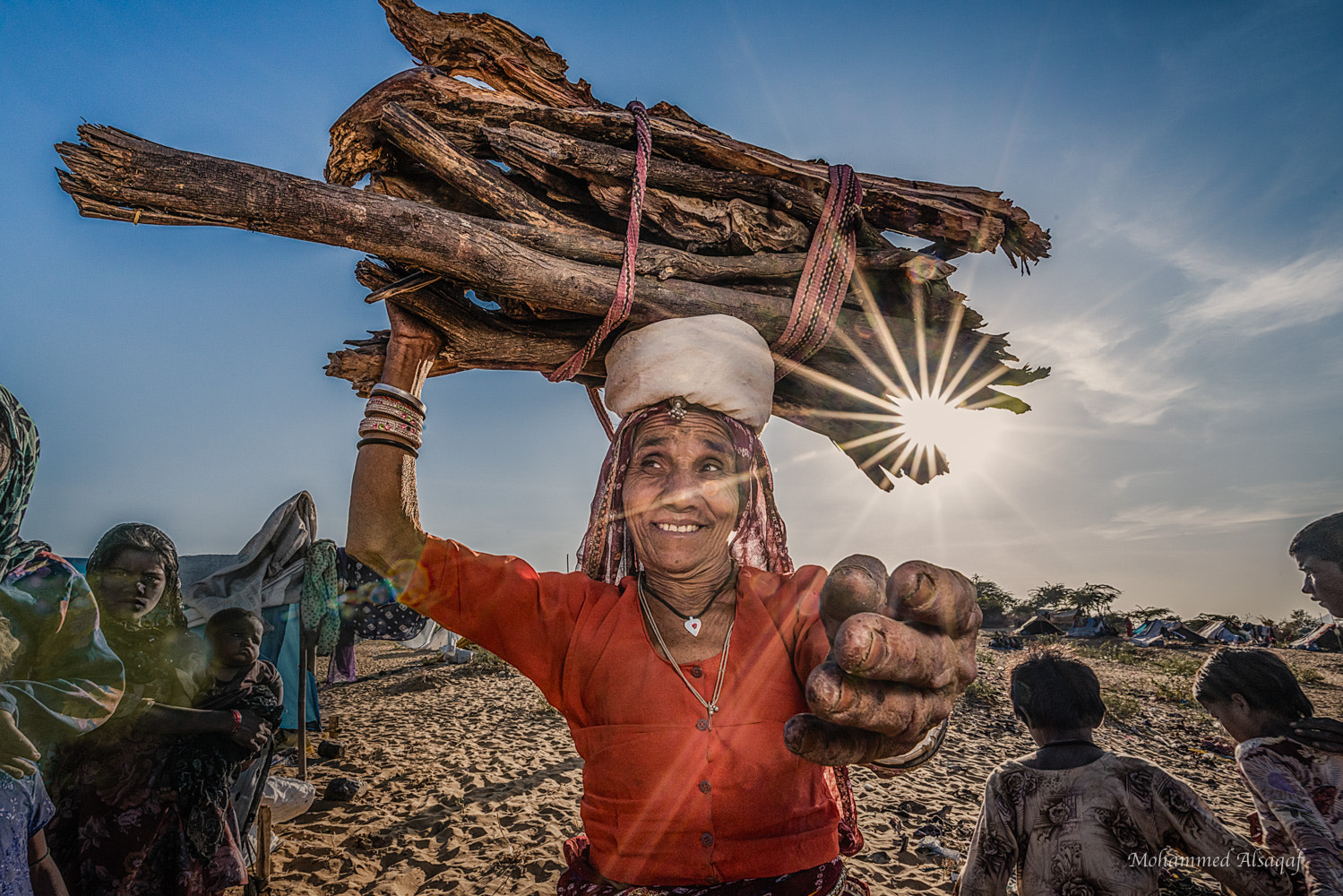 Sony a7R II + Sony Vario-Sonnar T* 16-35mm F2.8 ZA SSM sample photo. Woman of firewood photography