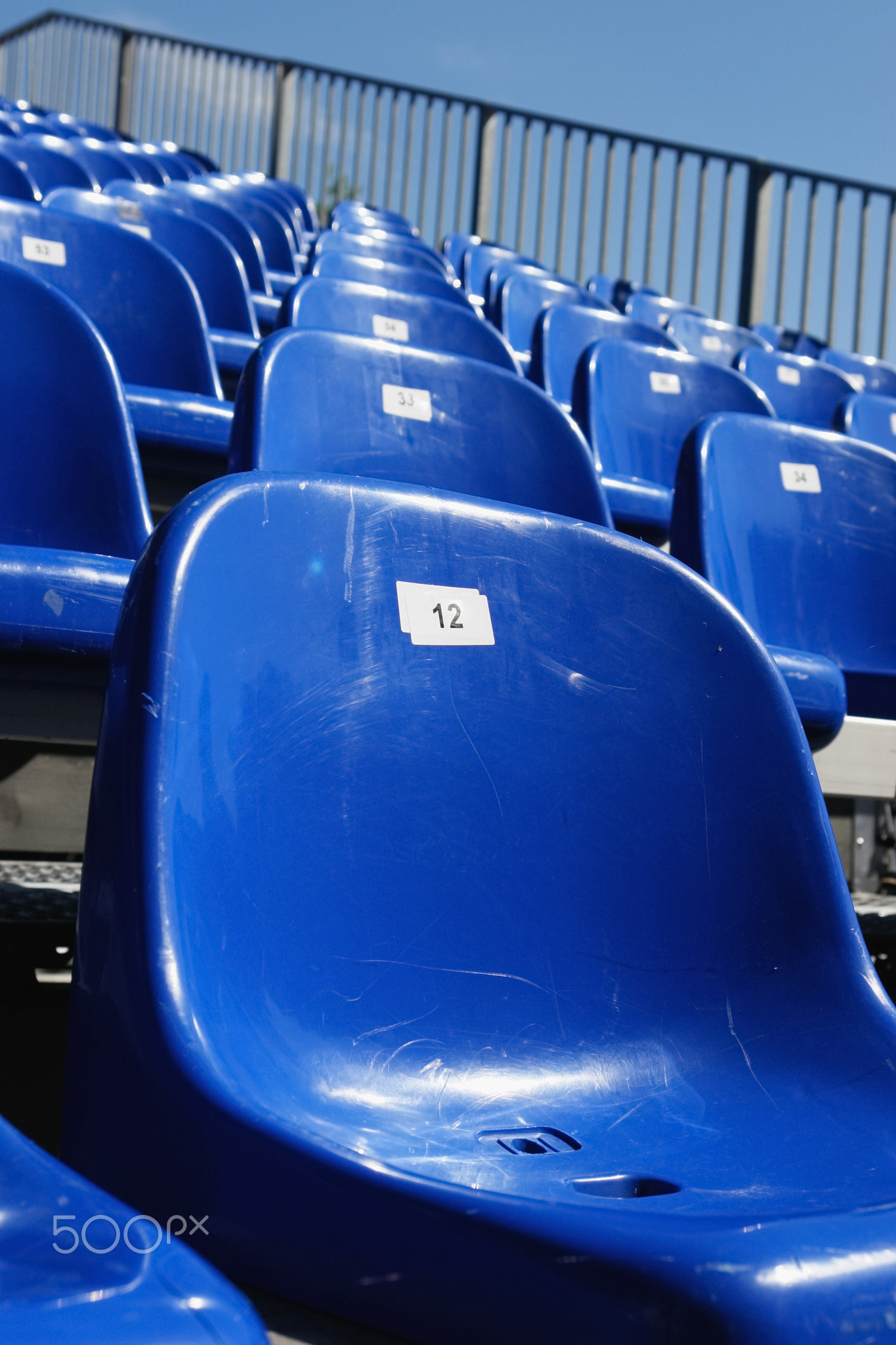 Blue Seats On Stadium