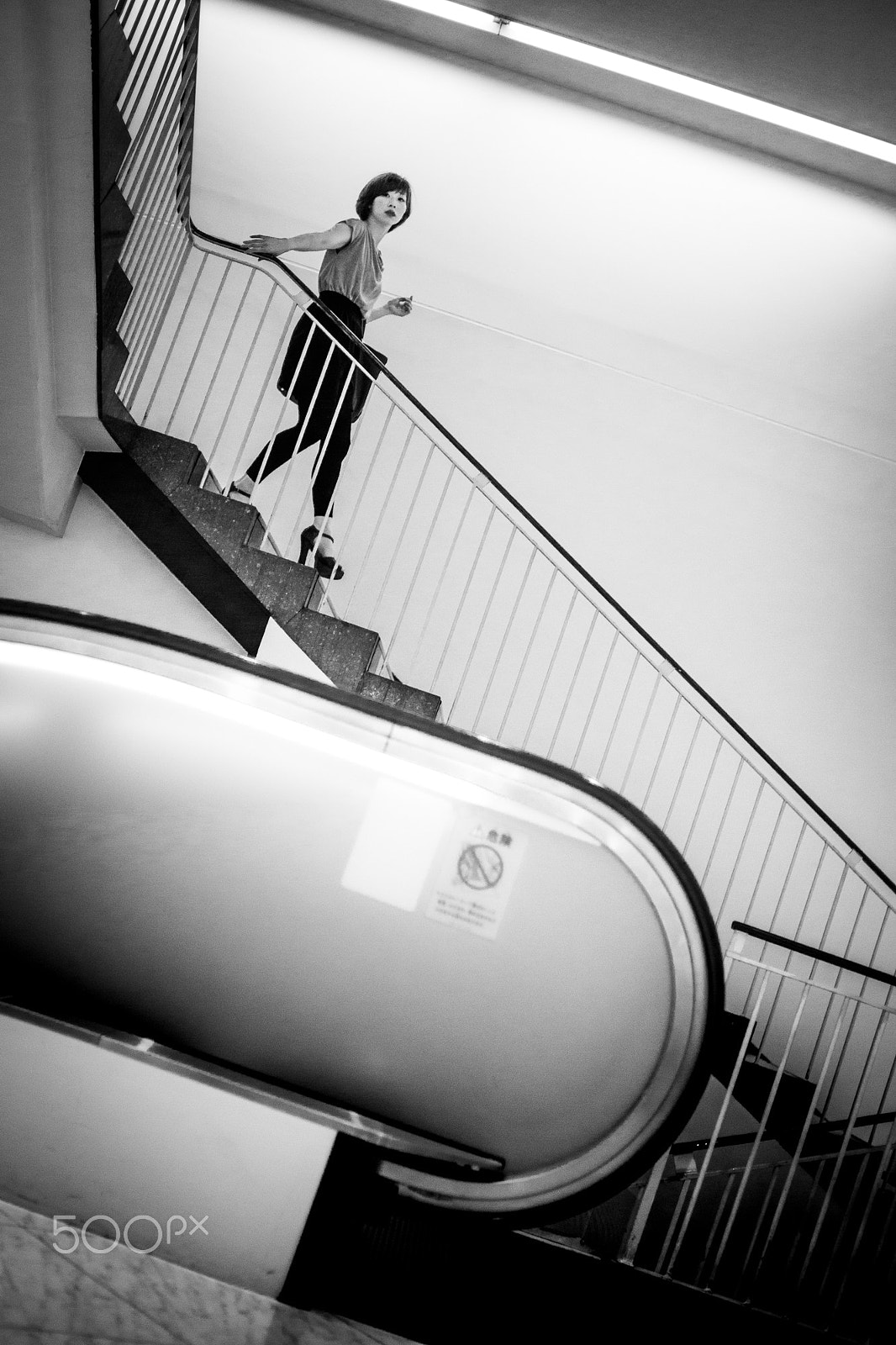 Sony Alpha NEX-7 + E 32mm F1.8 sample photo. Lady of the staircase photography