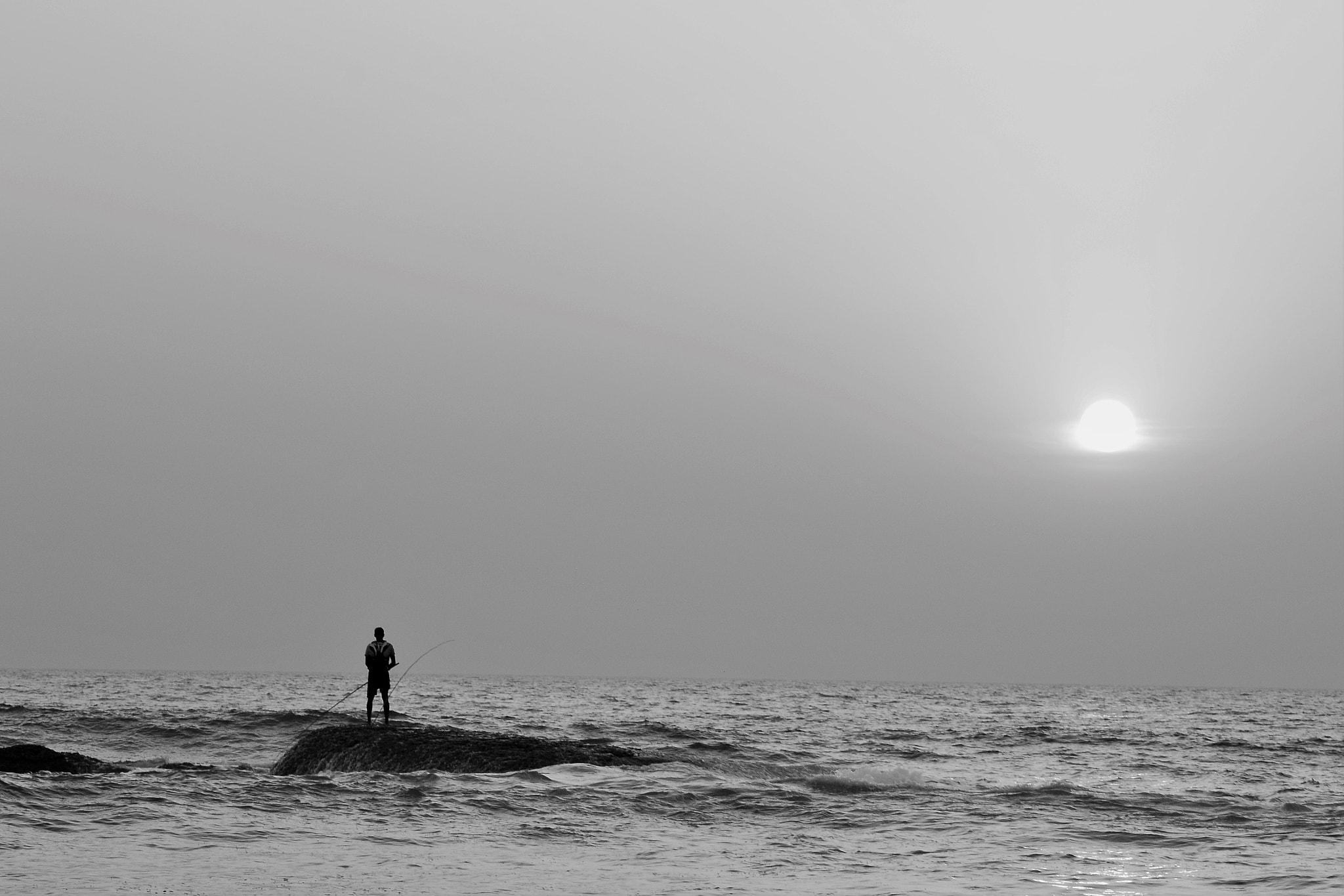 Nikon AF Nikkor 70-300mm F4-5.6G sample photo. Man by the sea photography
