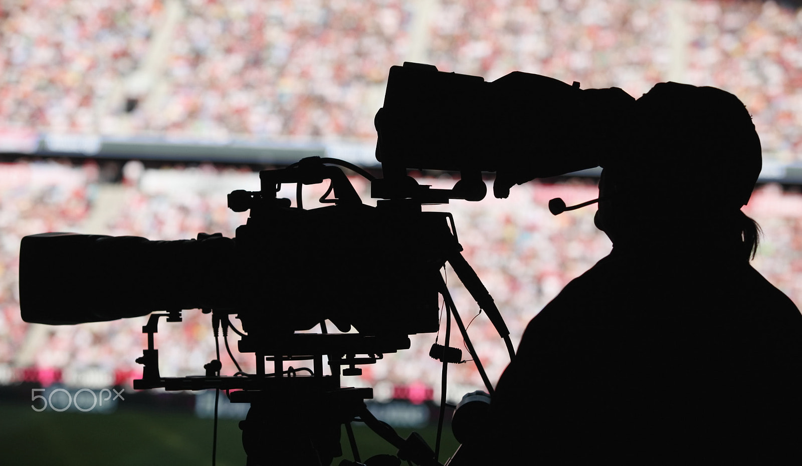 Canon EF 75-300mm F4.0-5.6 IS USM sample photo. Cameraman stadium photography