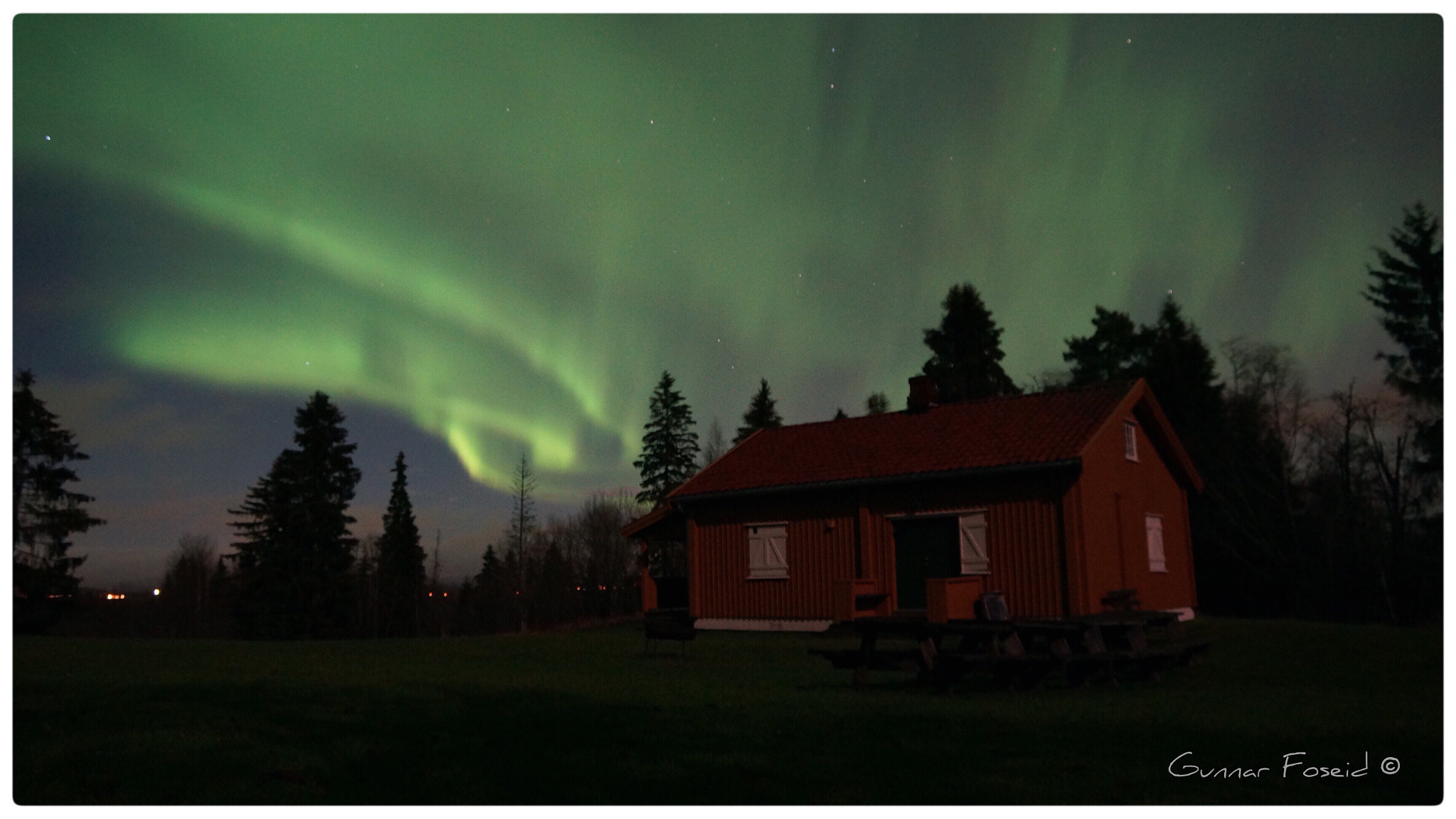 Sony NEX-VG20E sample photo. Northern light at the church ruins in nes municipality, norway. photography