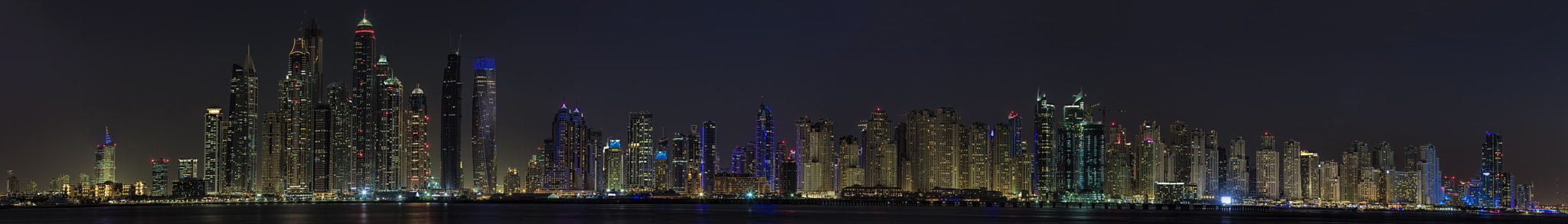 Canon EOS 600D (Rebel EOS T3i / EOS Kiss X5) + Canon EF 70-200mm F2.8L IS II USM sample photo. Dubai marina skyline at night photography