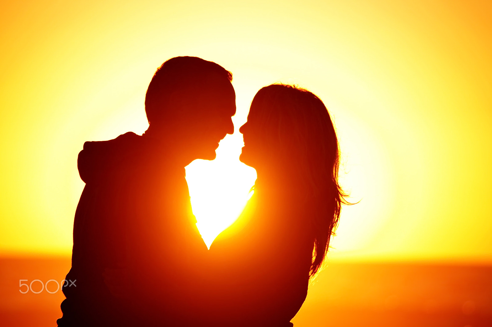 Pentax K-x sample photo. Loving couple beach sunset photography