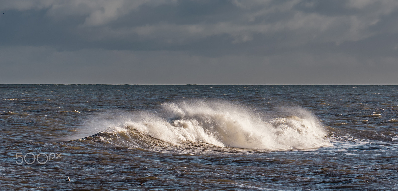 Panasonic Lumix G Vario 45-200mm F4-5.6 OIS sample photo. Northumbrian waves photography
