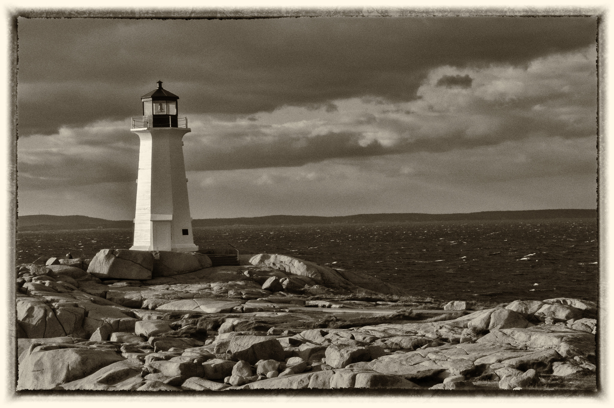 Canon EOS 650D (EOS Rebel T4i / EOS Kiss X6i) + Canon EF 40mm F2.8 STM sample photo. Peggy's cove lighthouse bw photography