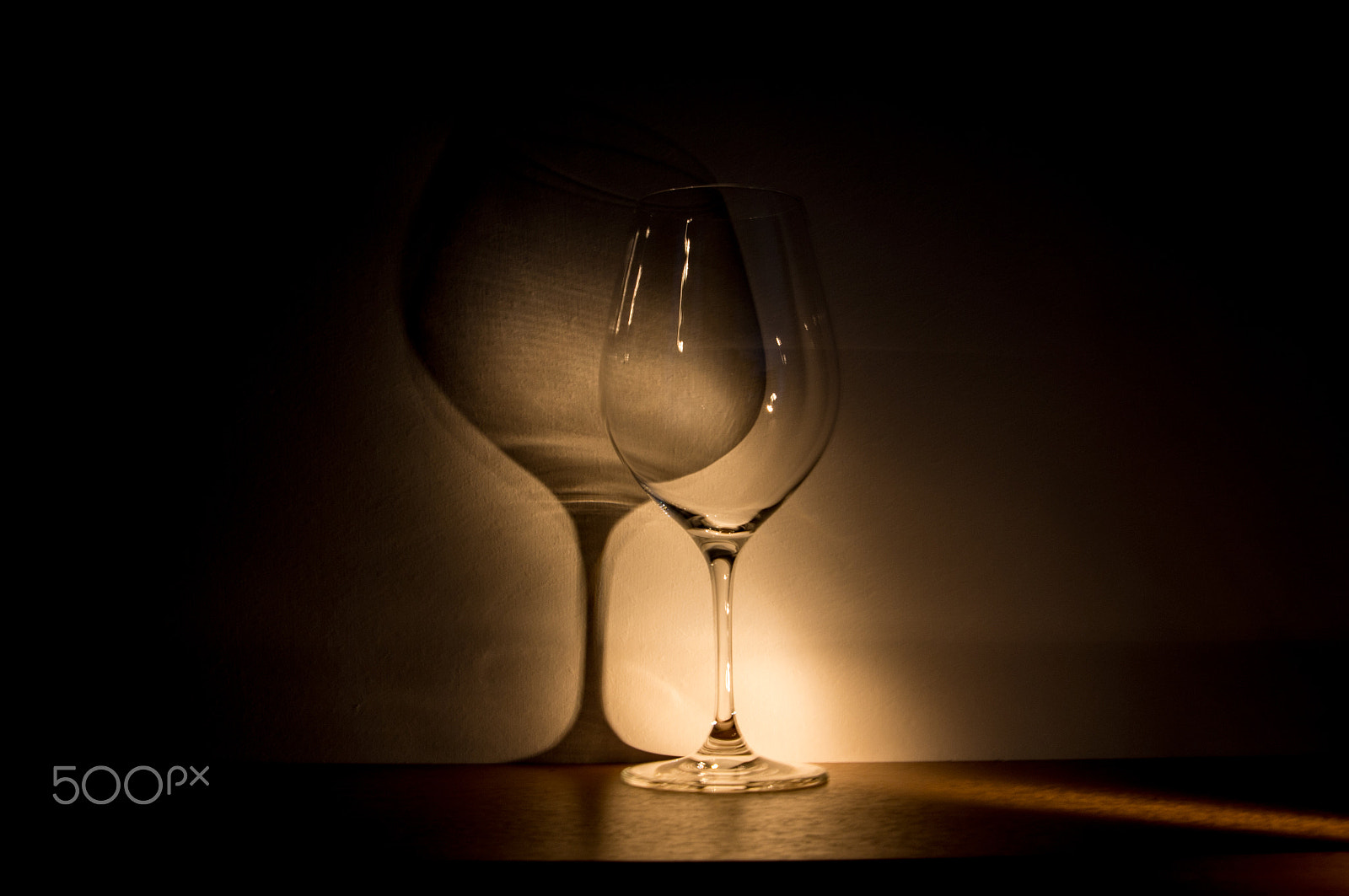 Sony Alpha DSLR-A580 + Sony 28-75mm F2.8 SAM sample photo. Large glass of red wine on dark background photography