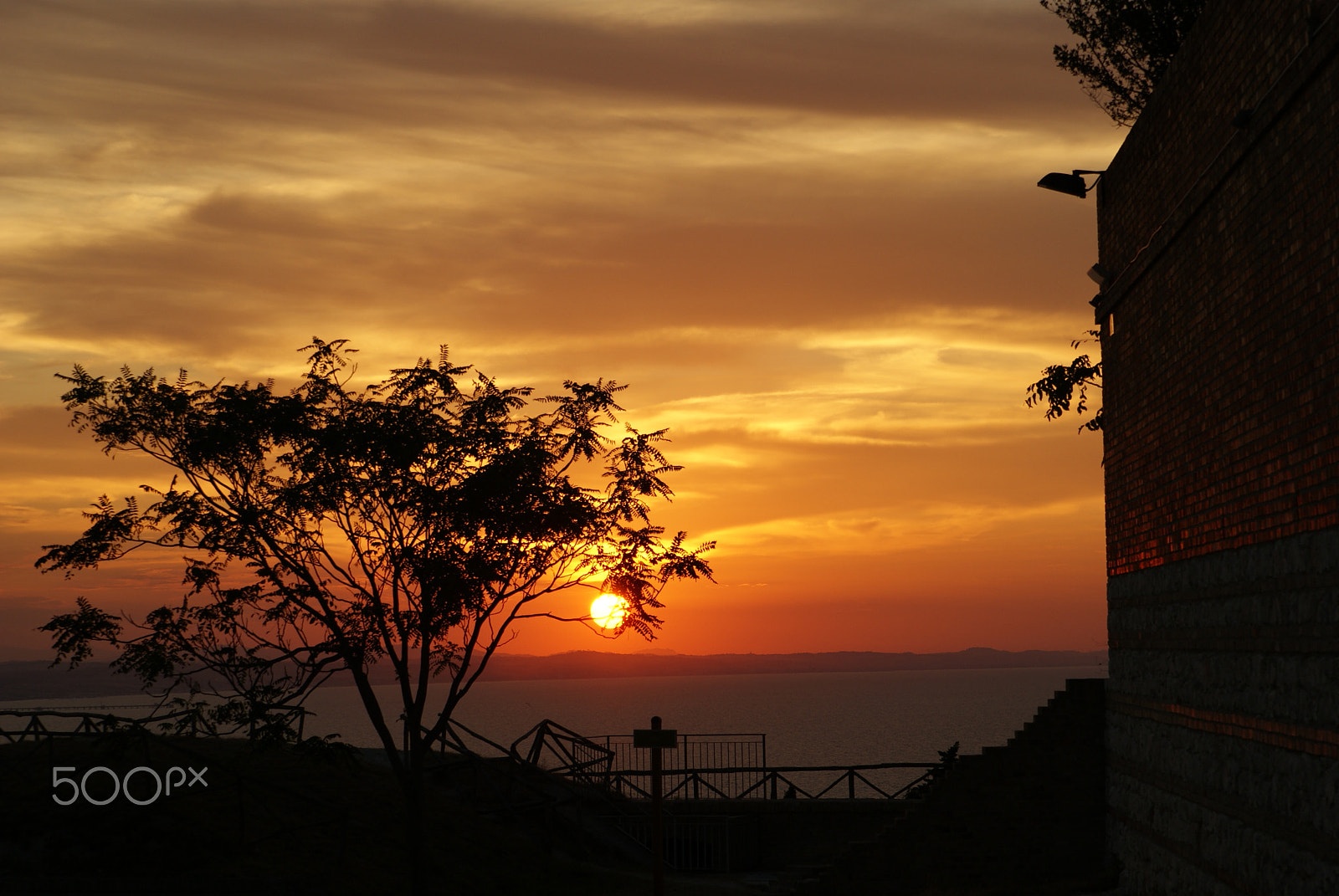 Sony Alpha DSLR-A230 sample photo. Church and black crosses sunset sky photography