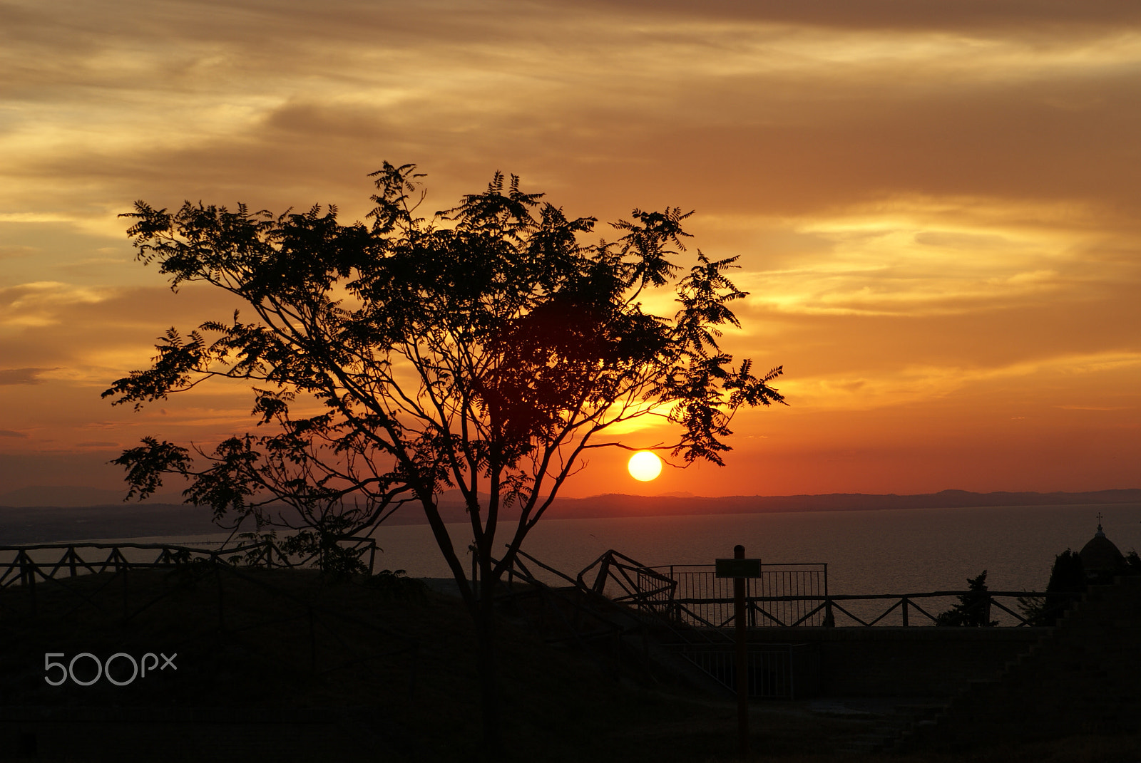 Sony Alpha DSLR-A230 + Sony 28-75mm F2.8 SAM sample photo. Church and black crosses sunset sky photography