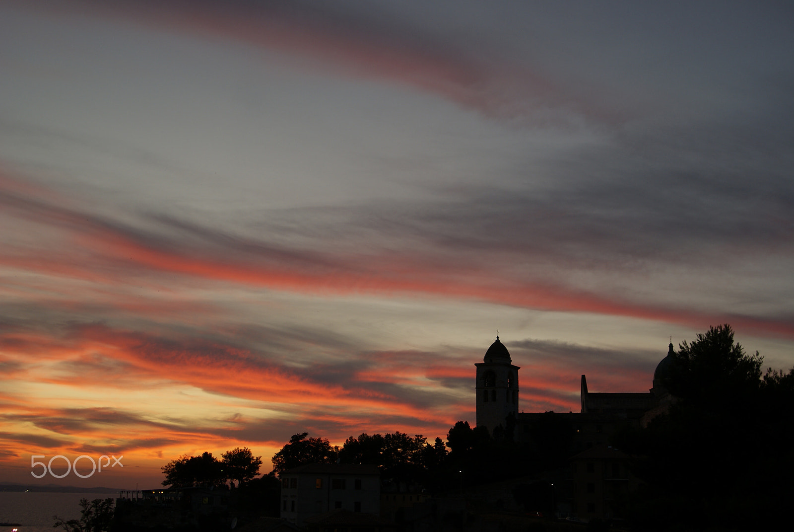 Sony Alpha DSLR-A230 sample photo. Sunset sky with gold lighted clouds photography