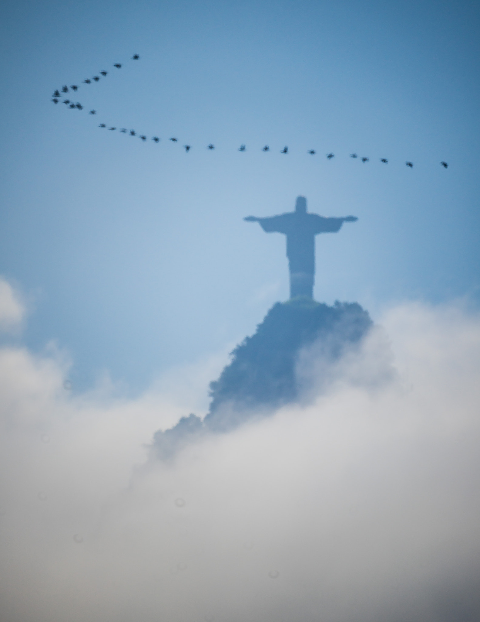 Sony a7 + Sony 500mm F8 Reflex sample photo. Christ &amp; birds in clouds from botafogo photography