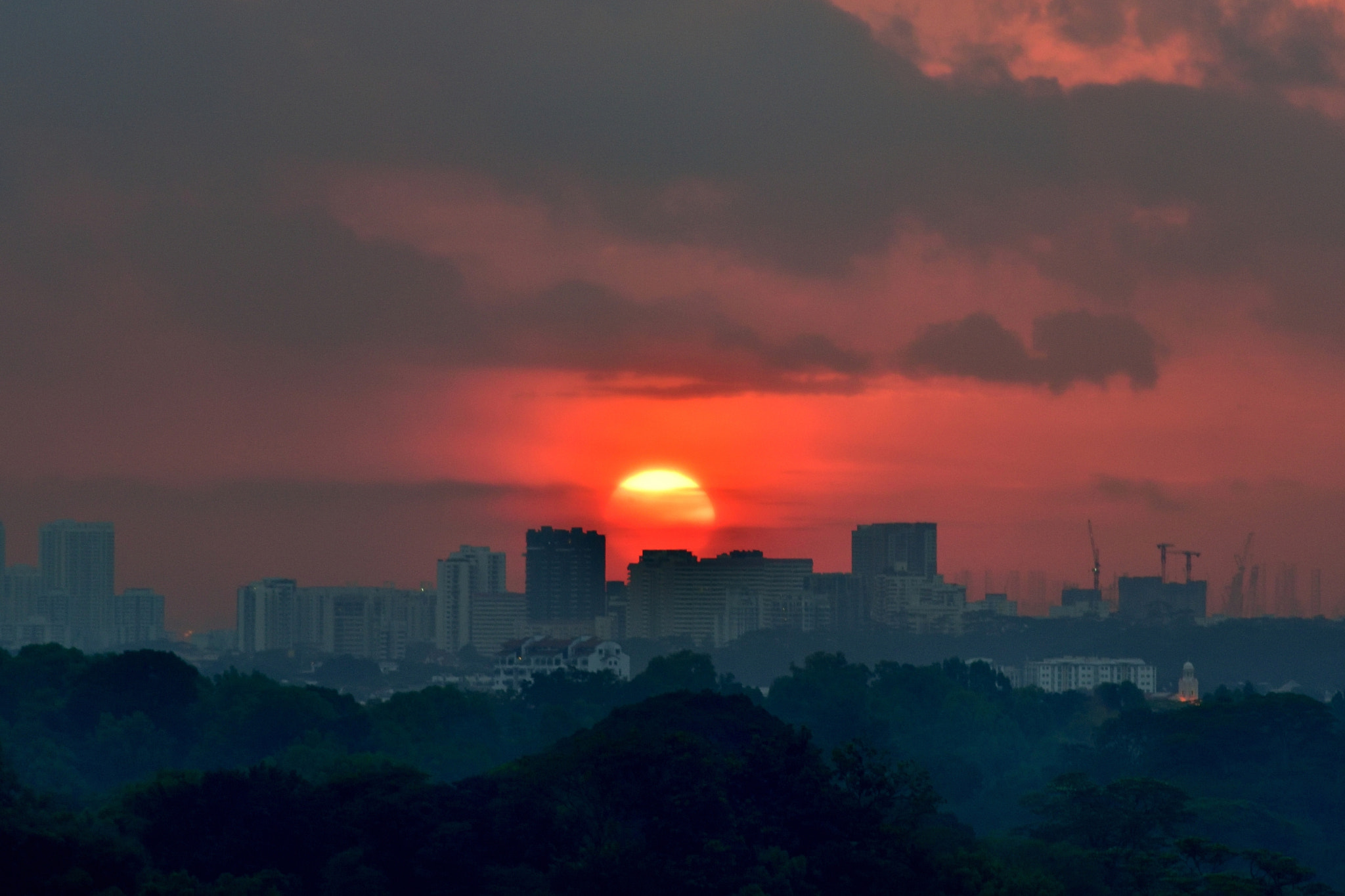 Nikon D750 + Nikon AF Nikkor 180mm F2.8D ED-IF sample photo. Sunset over cityscape skyline photography