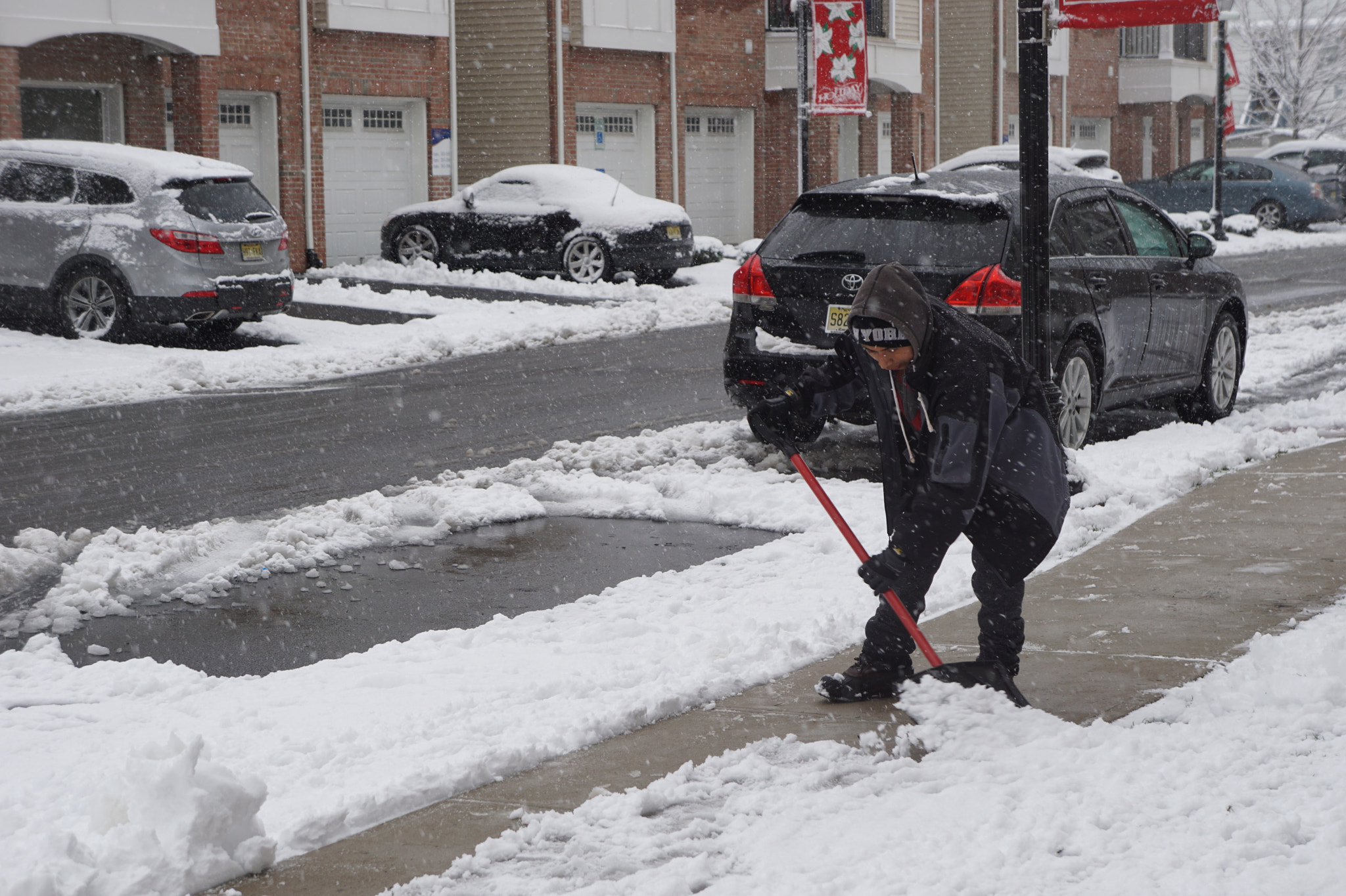 Sony E 18-55mm F3.5-5.6 OSS sample photo. Snow day, shovel day photography