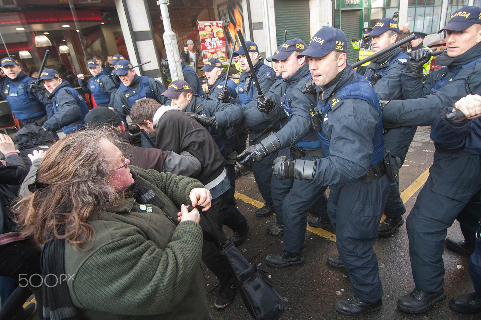 Canon EOS-1D Mark III sample photo. Gards attack protesters photography