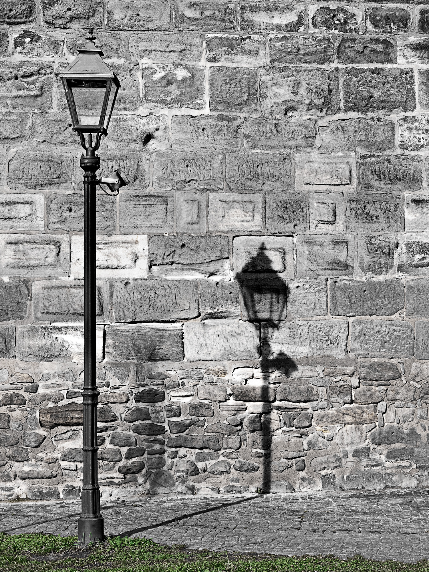 OLYMPUS 50mm Lens sample photo. Lamp with shadow on the wall photography