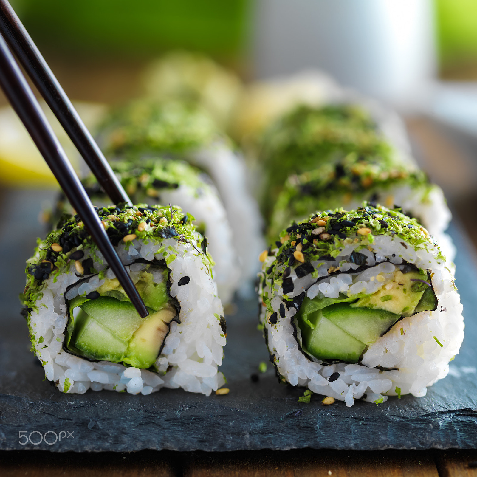 Hasselblad H3DII-39 sample photo. Healthy kale and avocado sushi roll with chopsticks photography
