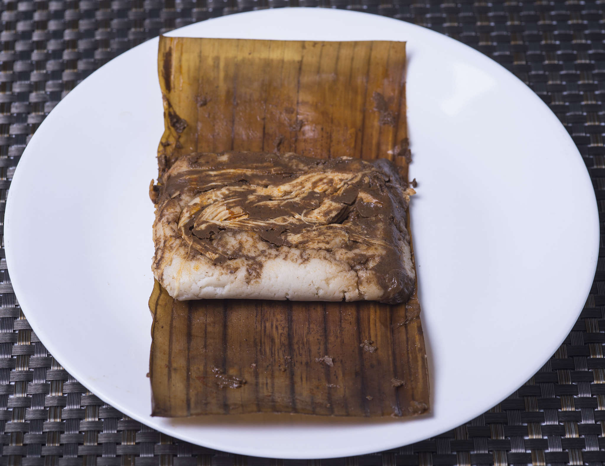 Nikon D4 + Sigma 105mm F2.8 EX DG Macro sample photo. Tamal de pollo con mole / chicken mole tamale photography