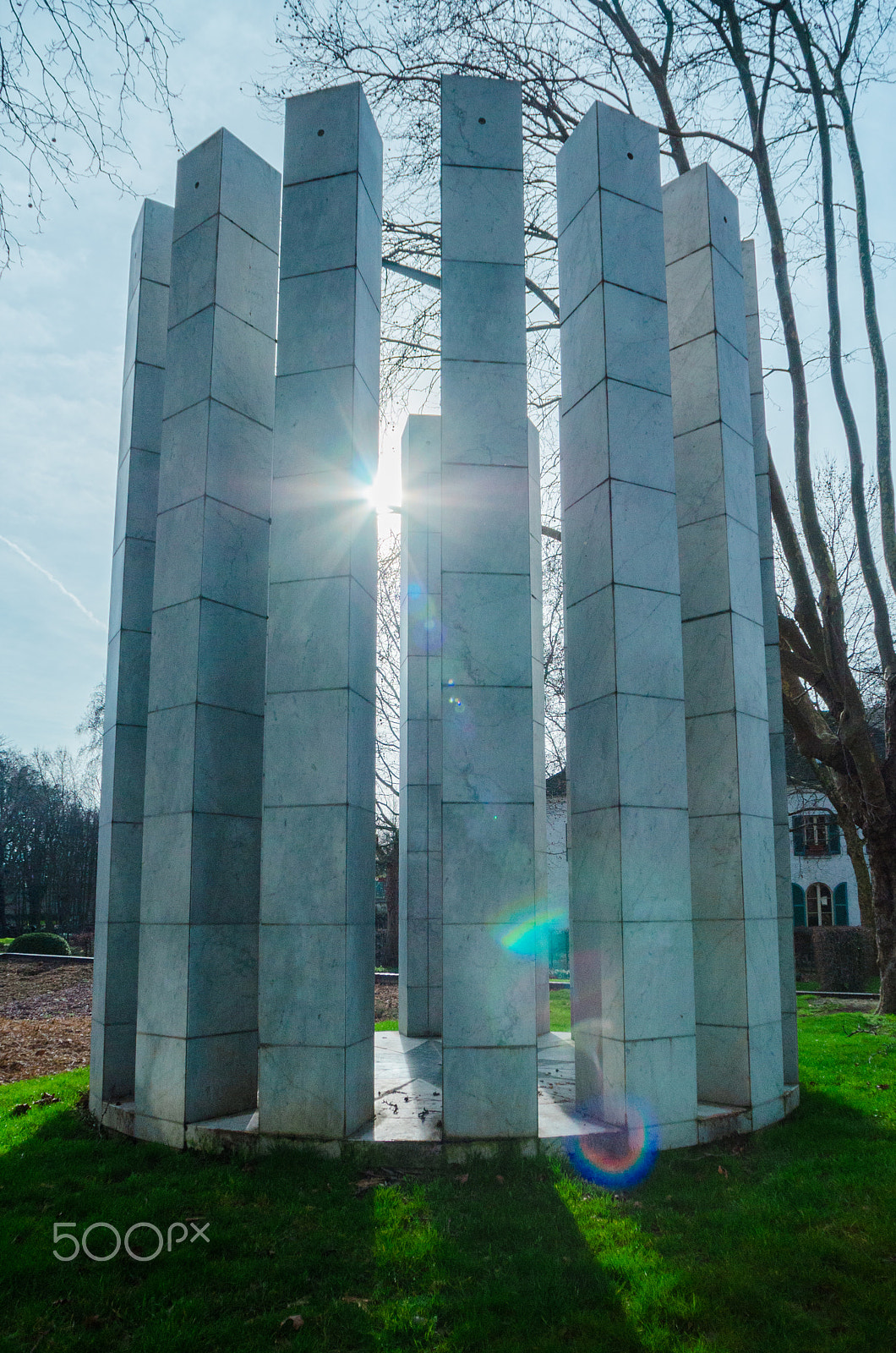 Sigma 14mm F3.5 sample photo. Parc de bercy columns with sunflare photography