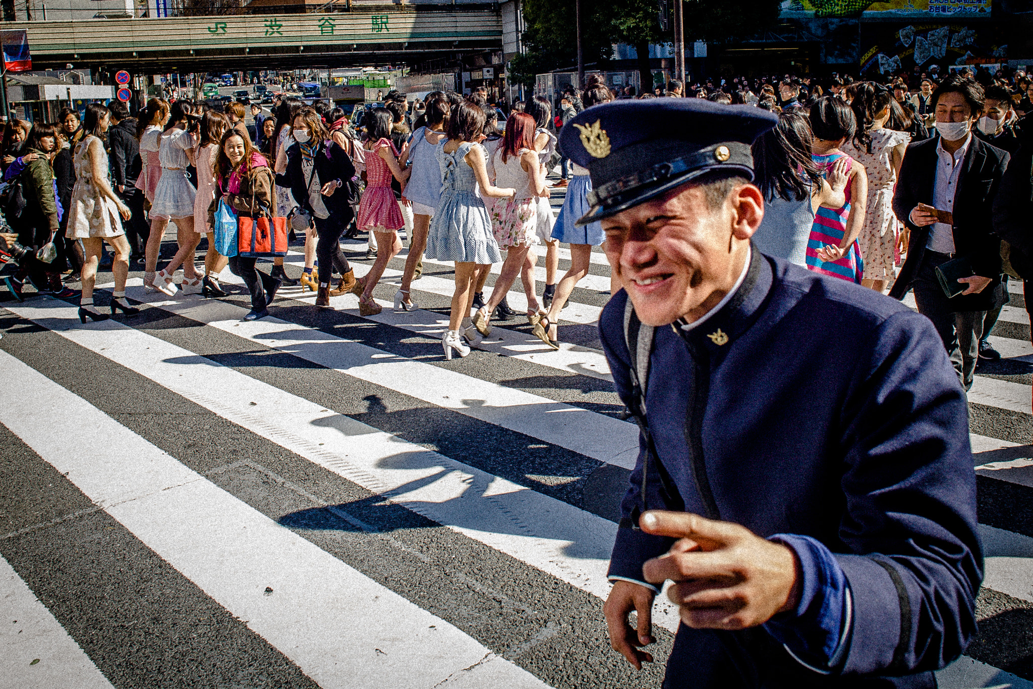 Canon EOS 5D + Canon EF 24mm F2.8 sample photo. The man in the blue uniform photography